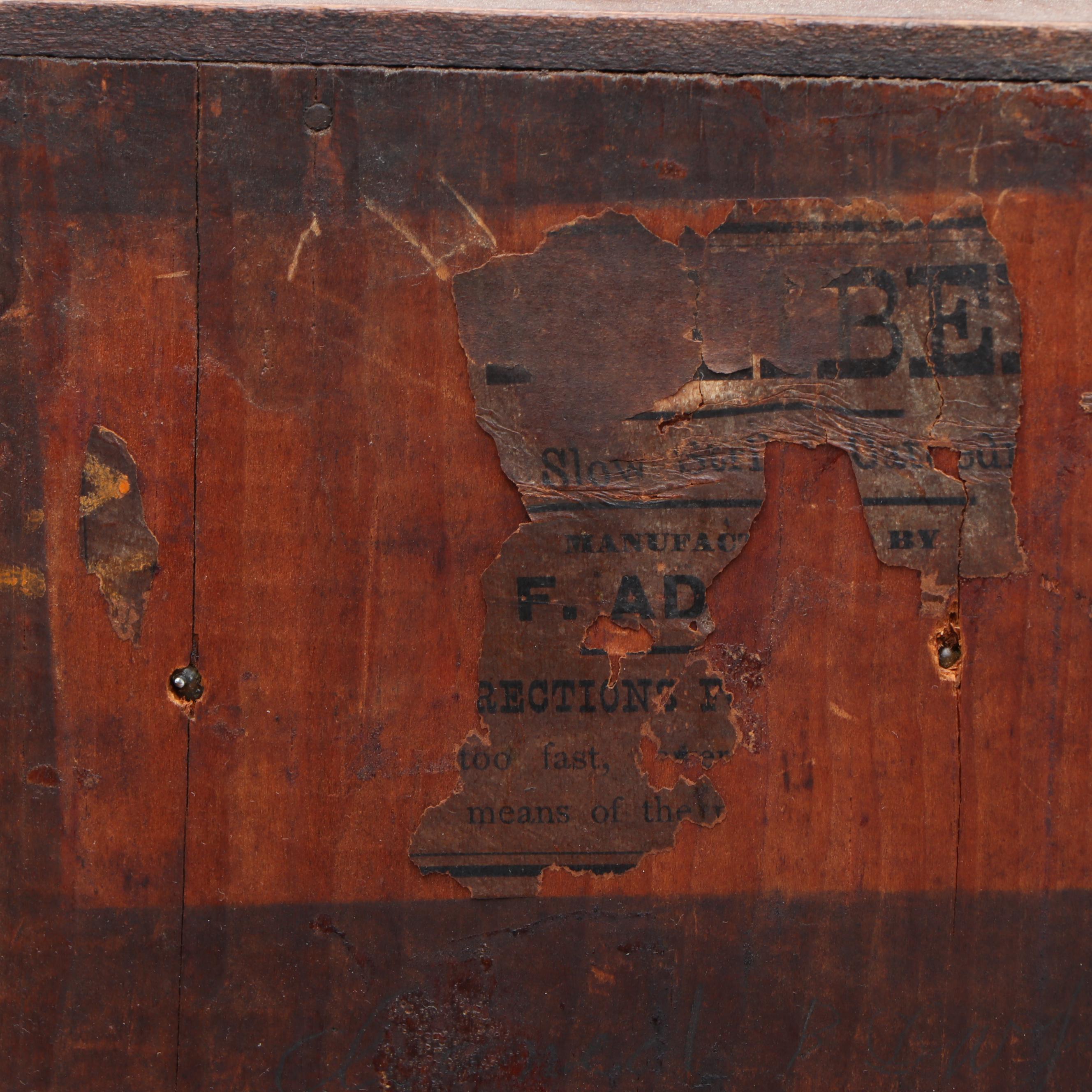 E. Ingraham Carved Walnut Kitchen Clock, Late 19th/ Early 20th Century