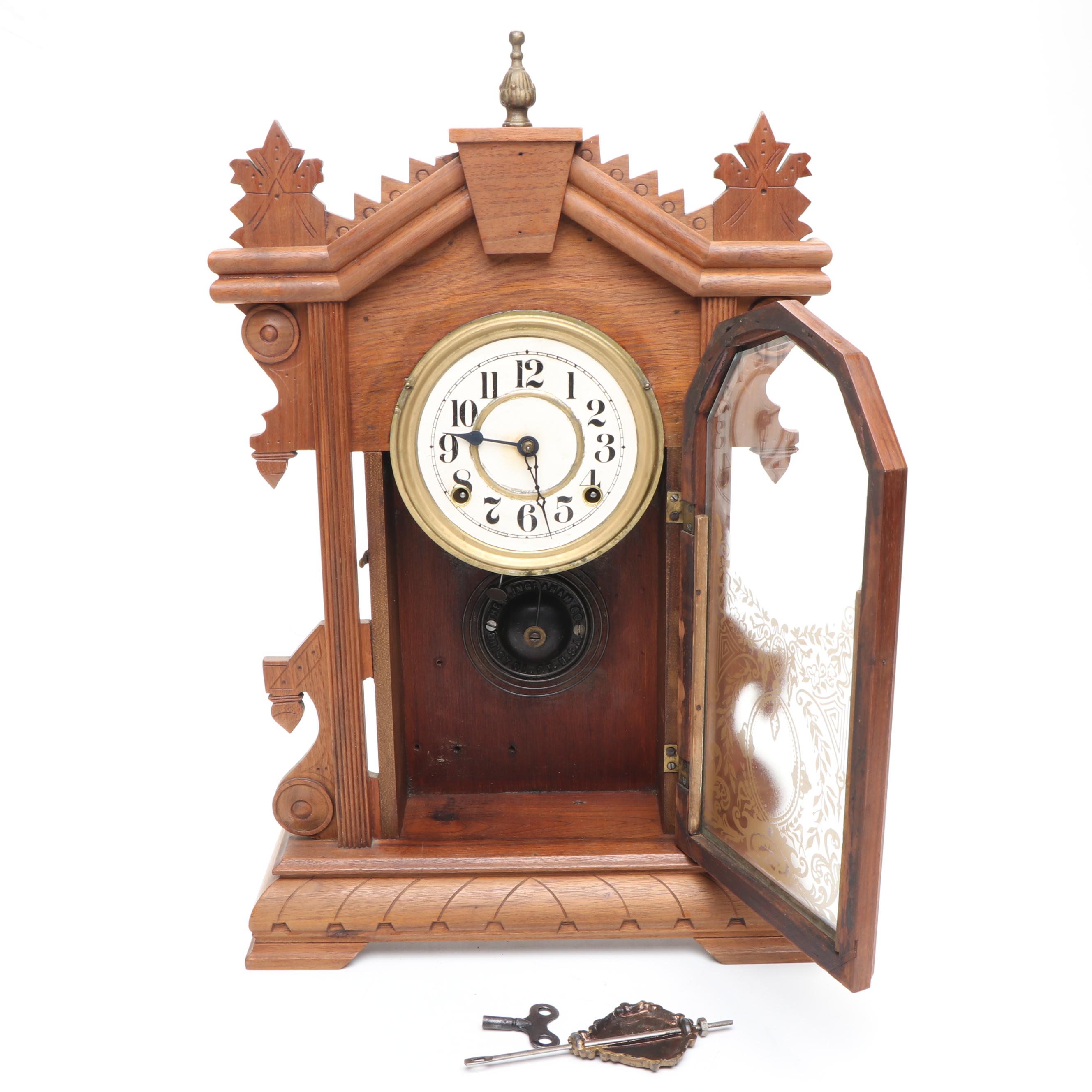 E. Ingraham Carved Walnut Kitchen Clock, Late 19th/ Early 20th Century