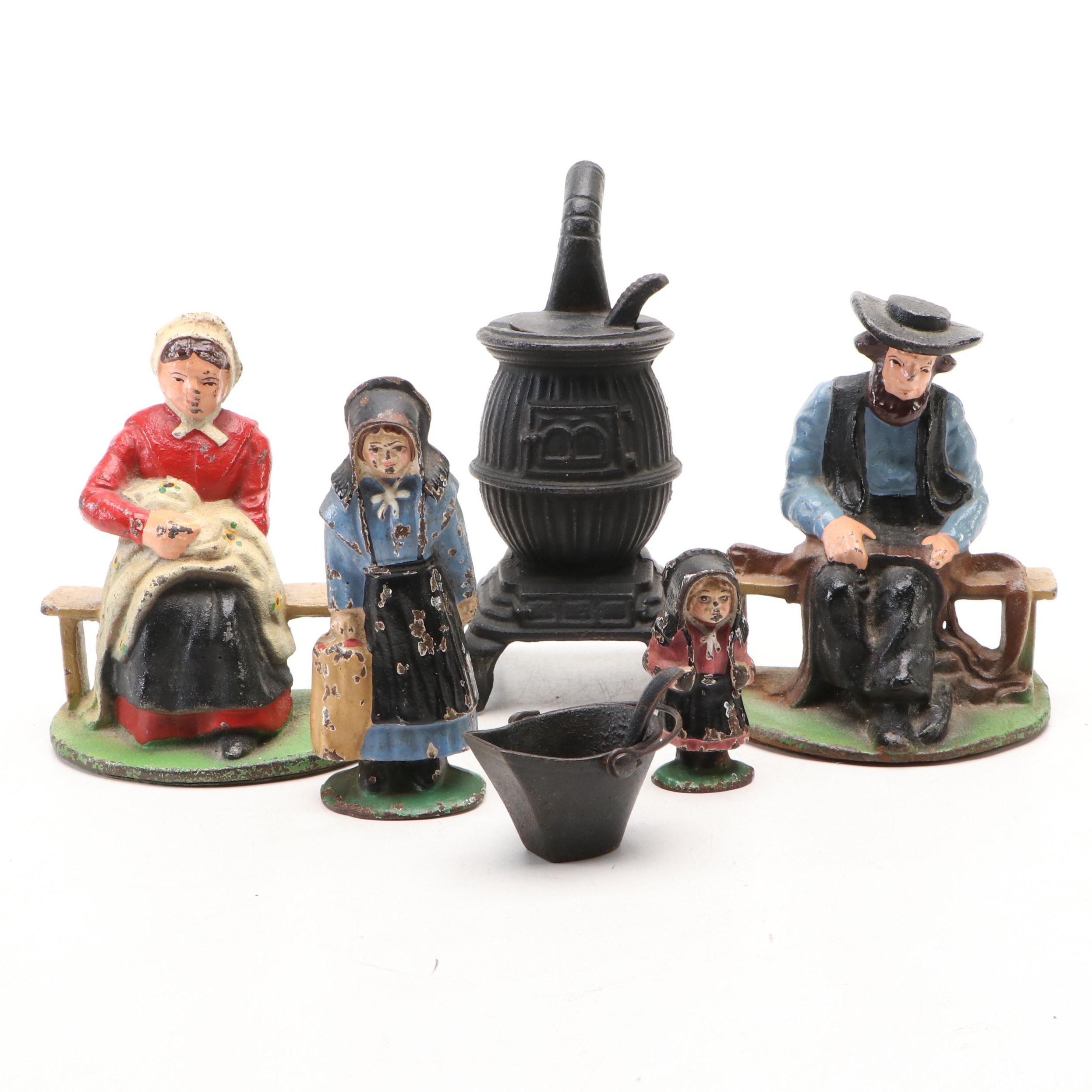 Wilton Amish Cast Iron Bookends with Other Figurines, 20th Century