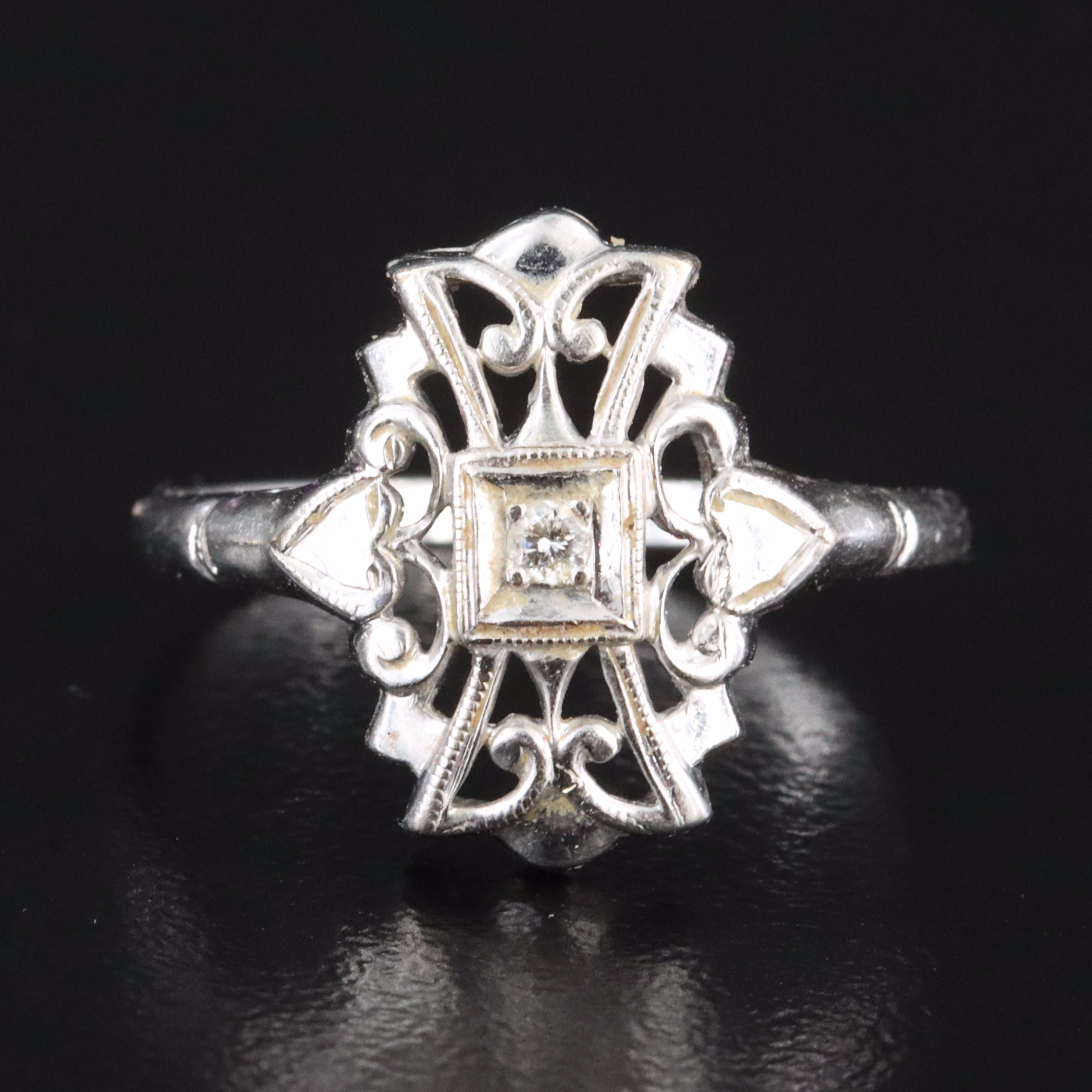 14K 0.03 CT Diamond Ring