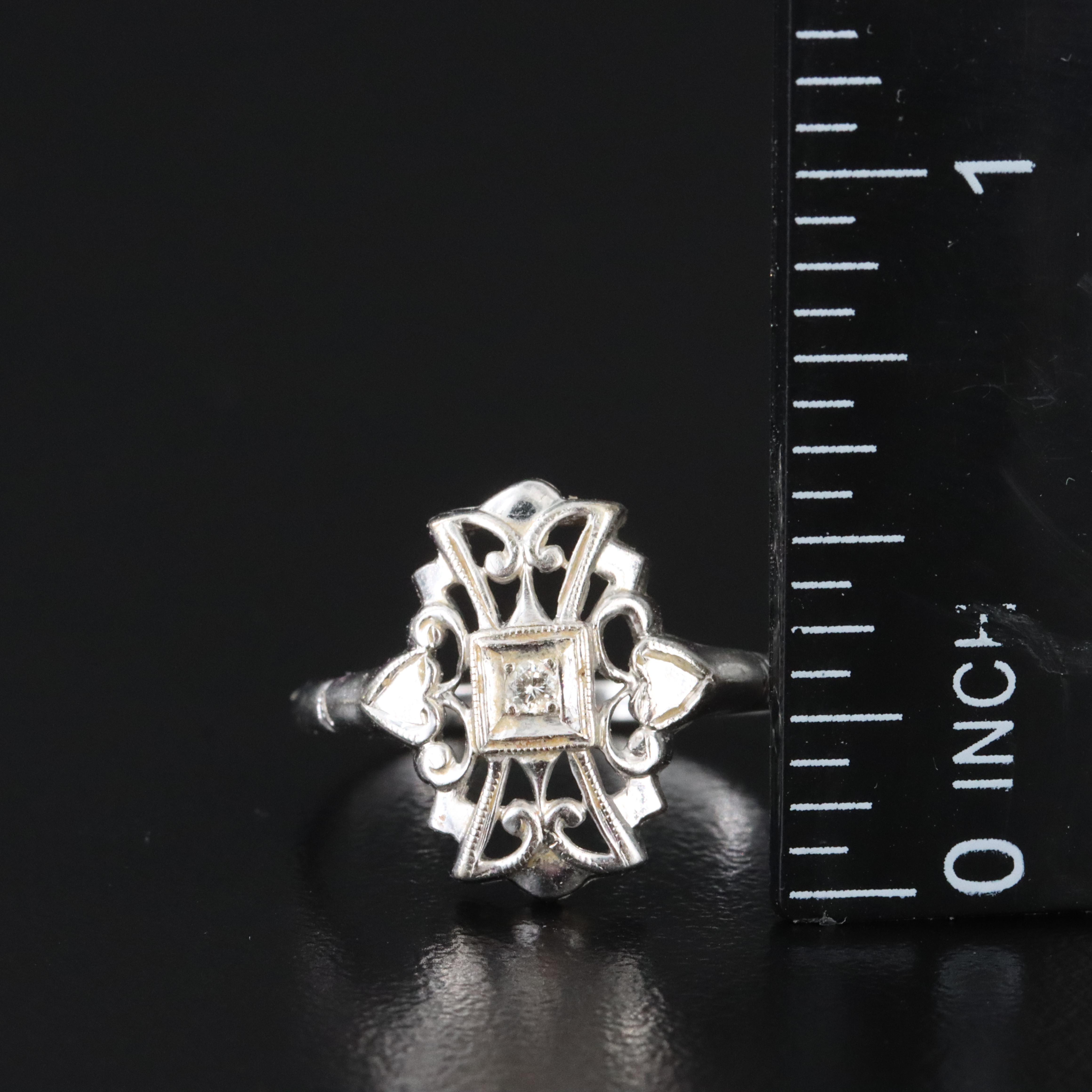 14K 0.03 CT Diamond Ring