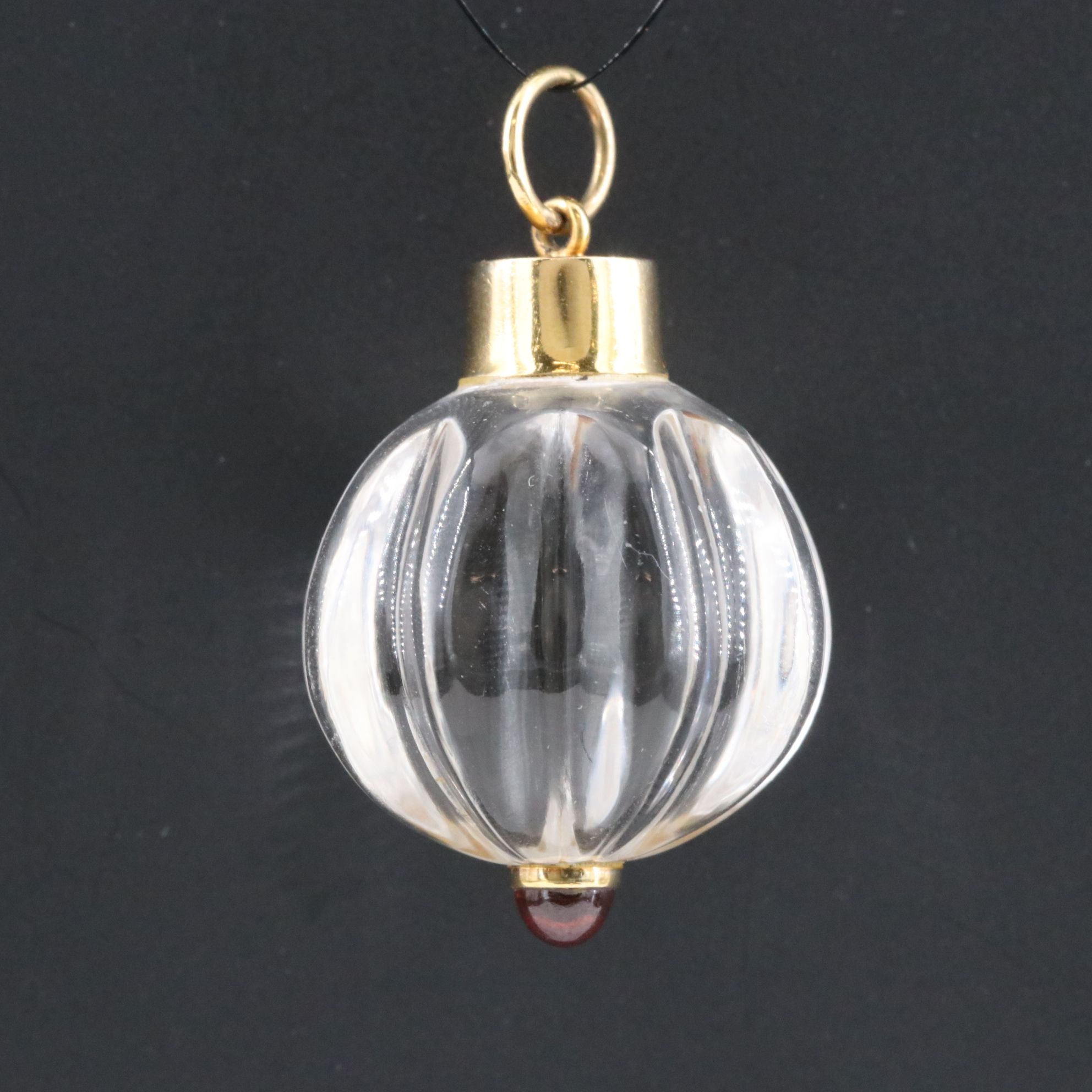 Carved Rock Crystal and Garnet Pendant with 18K Accents