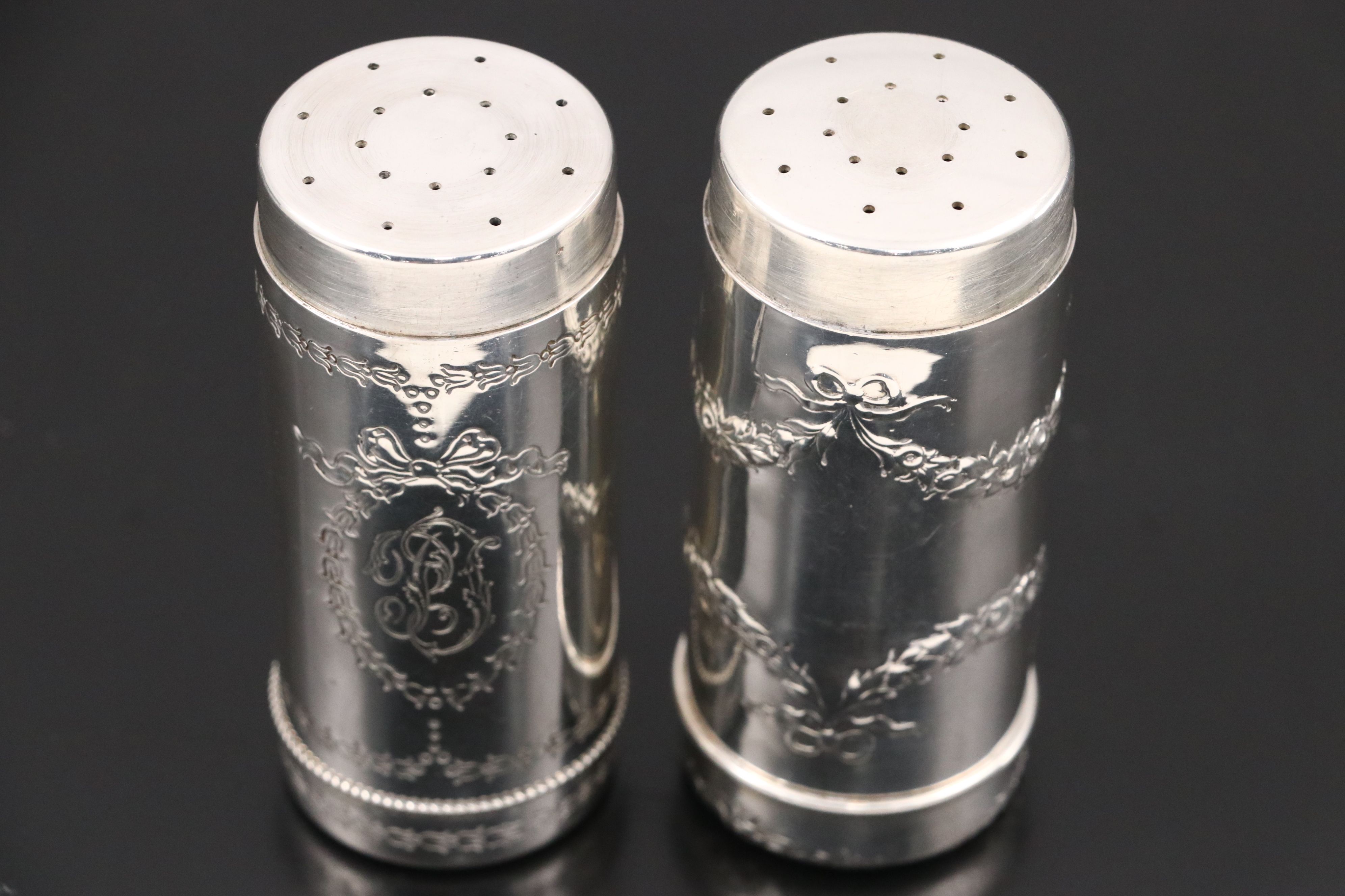Howard & Co. Sterling Silver Repoussé Shaker Set