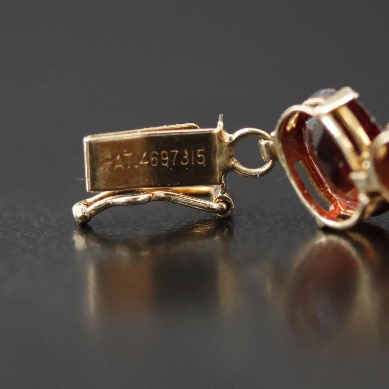 14K Garnet Line Bracelet