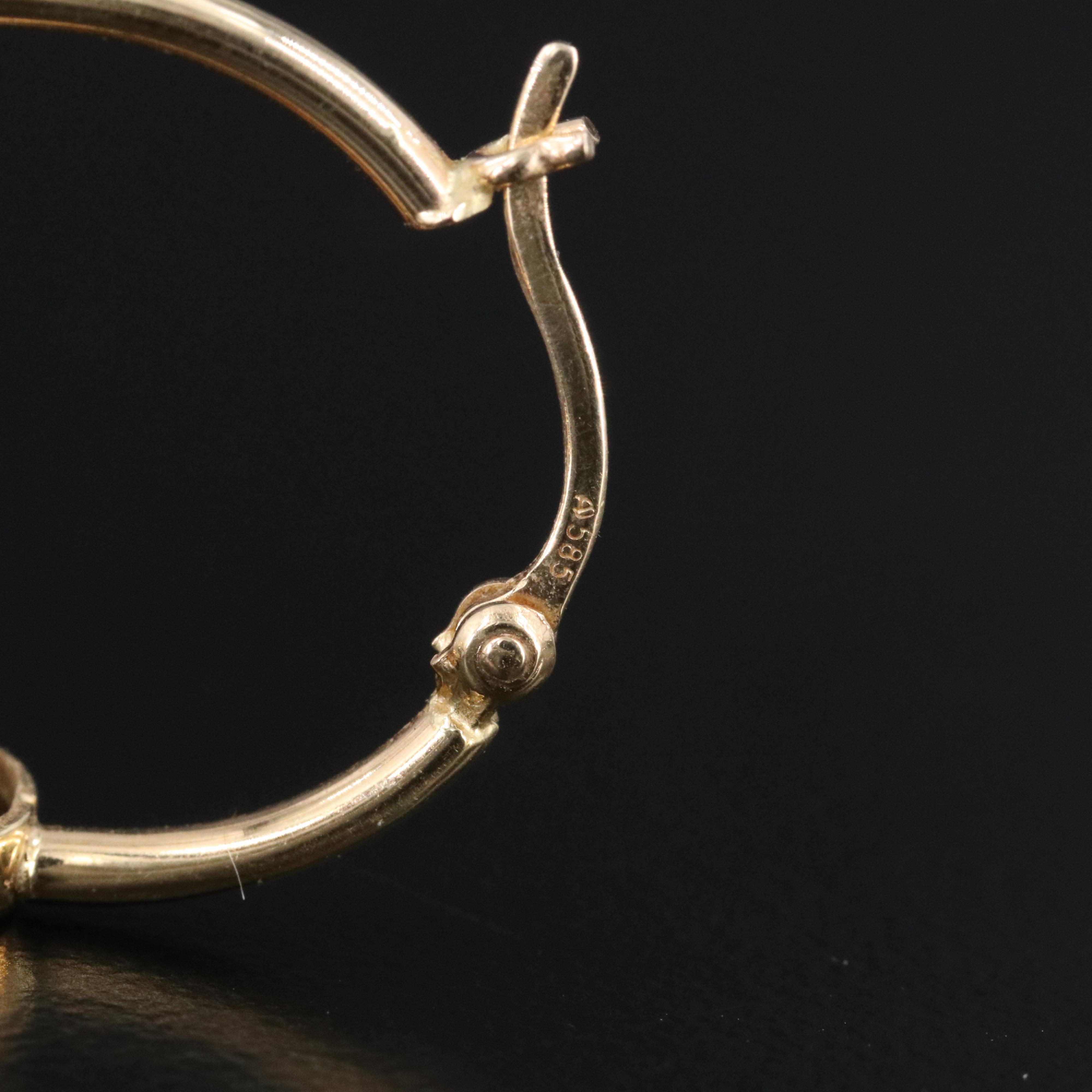 14K Garnet Oval Hoop Earrings