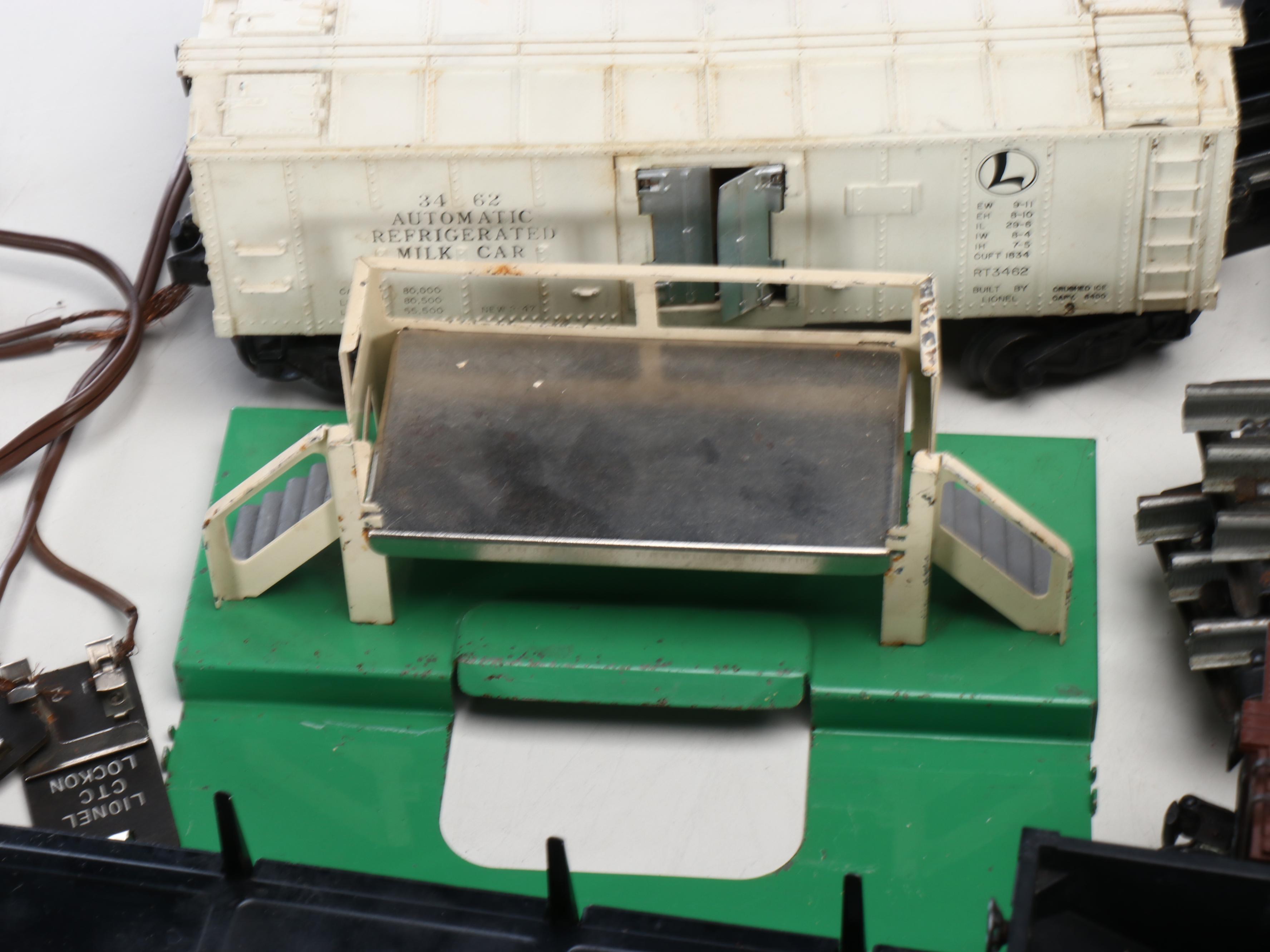 Lionel Train Cars with Assortment of Tracks