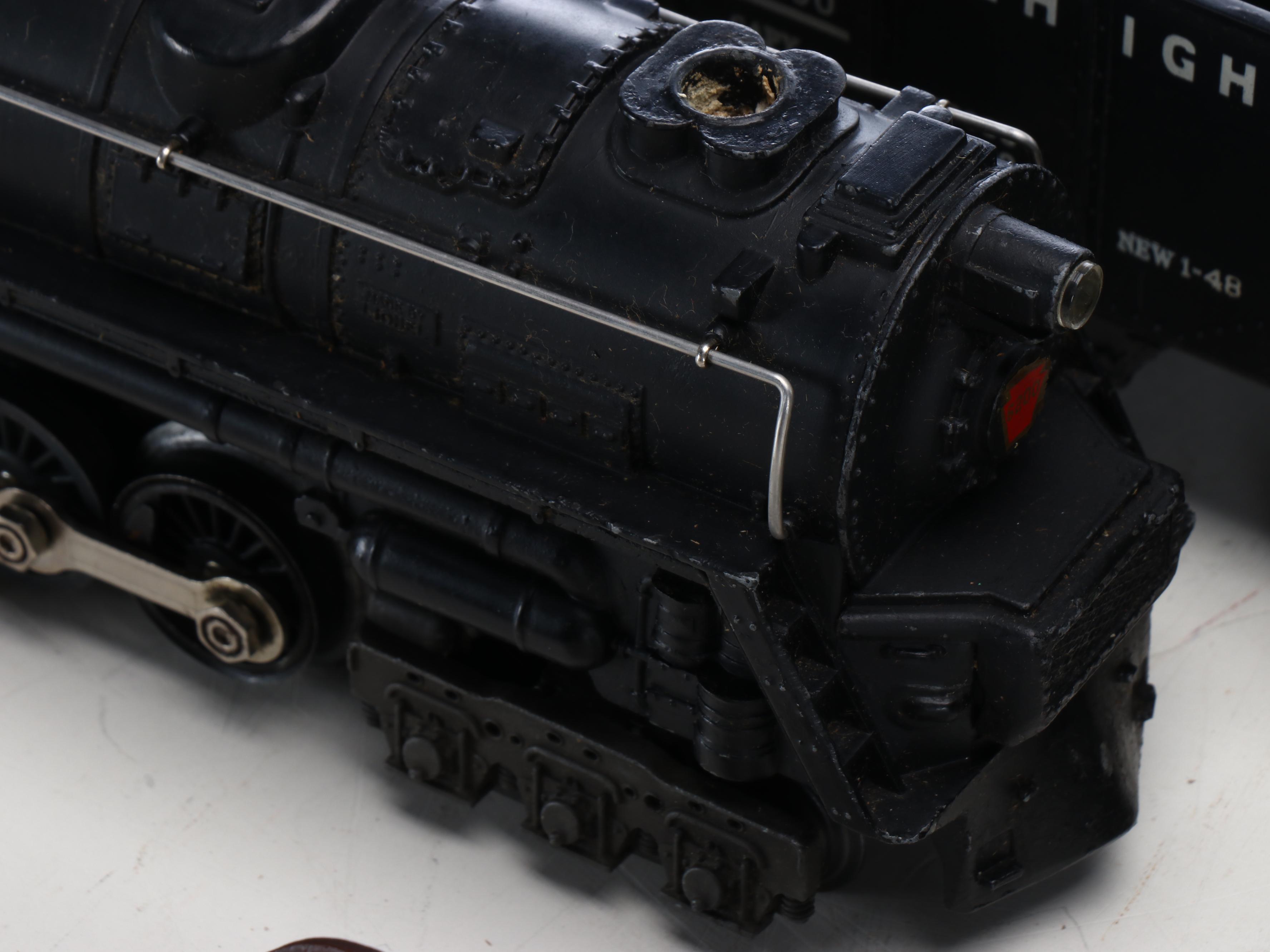 Lionel Train Cars with Assortment of Tracks