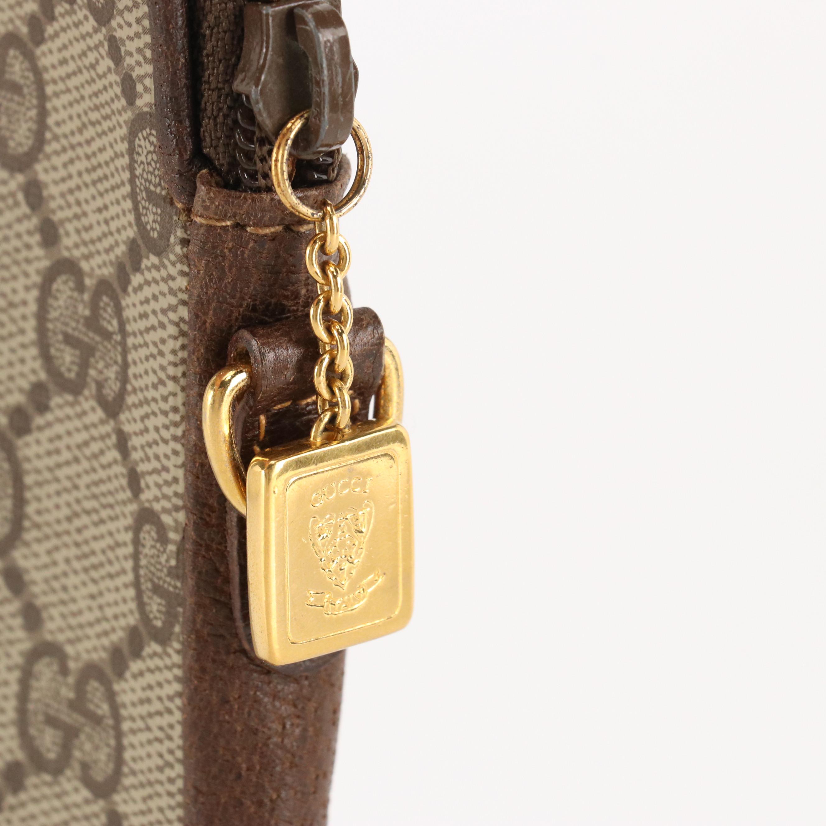 Gucci Vintage Zip Clutch in GG Supreme Coated Canvas and Brown Leather Trim