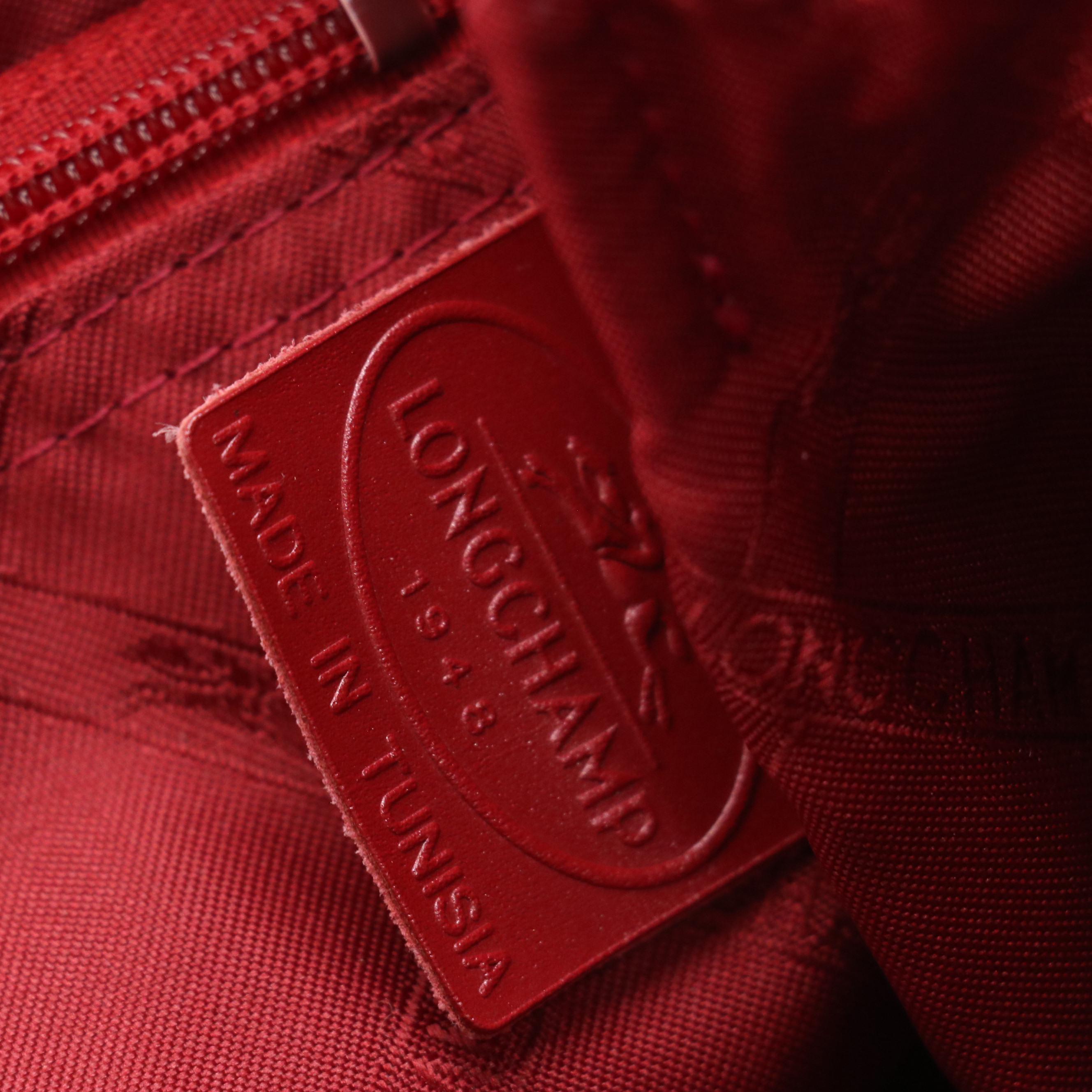 Longchamp Zippered Handbag in Shimmery Red Calfskin Leather