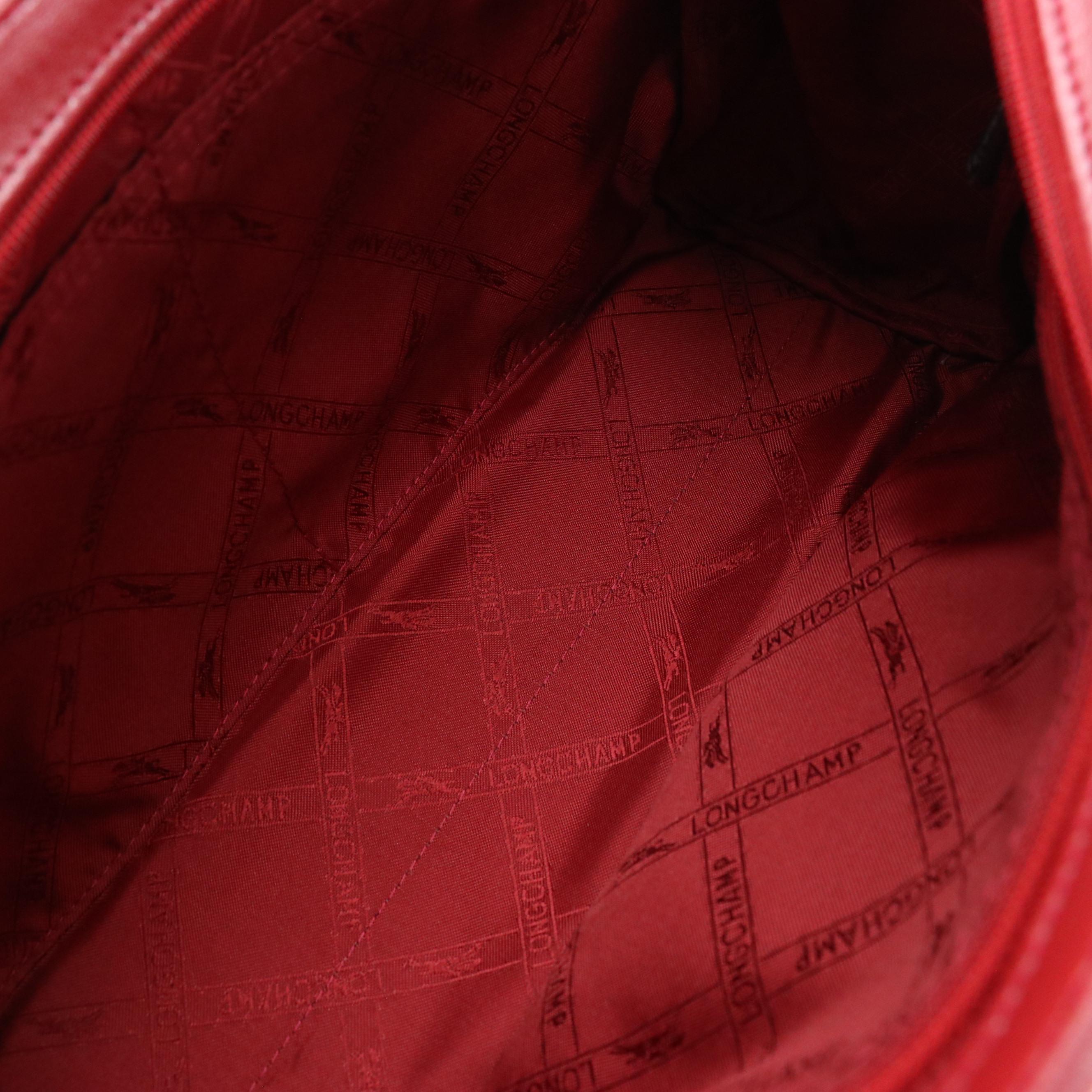 Longchamp Zippered Handbag in Shimmery Red Calfskin Leather