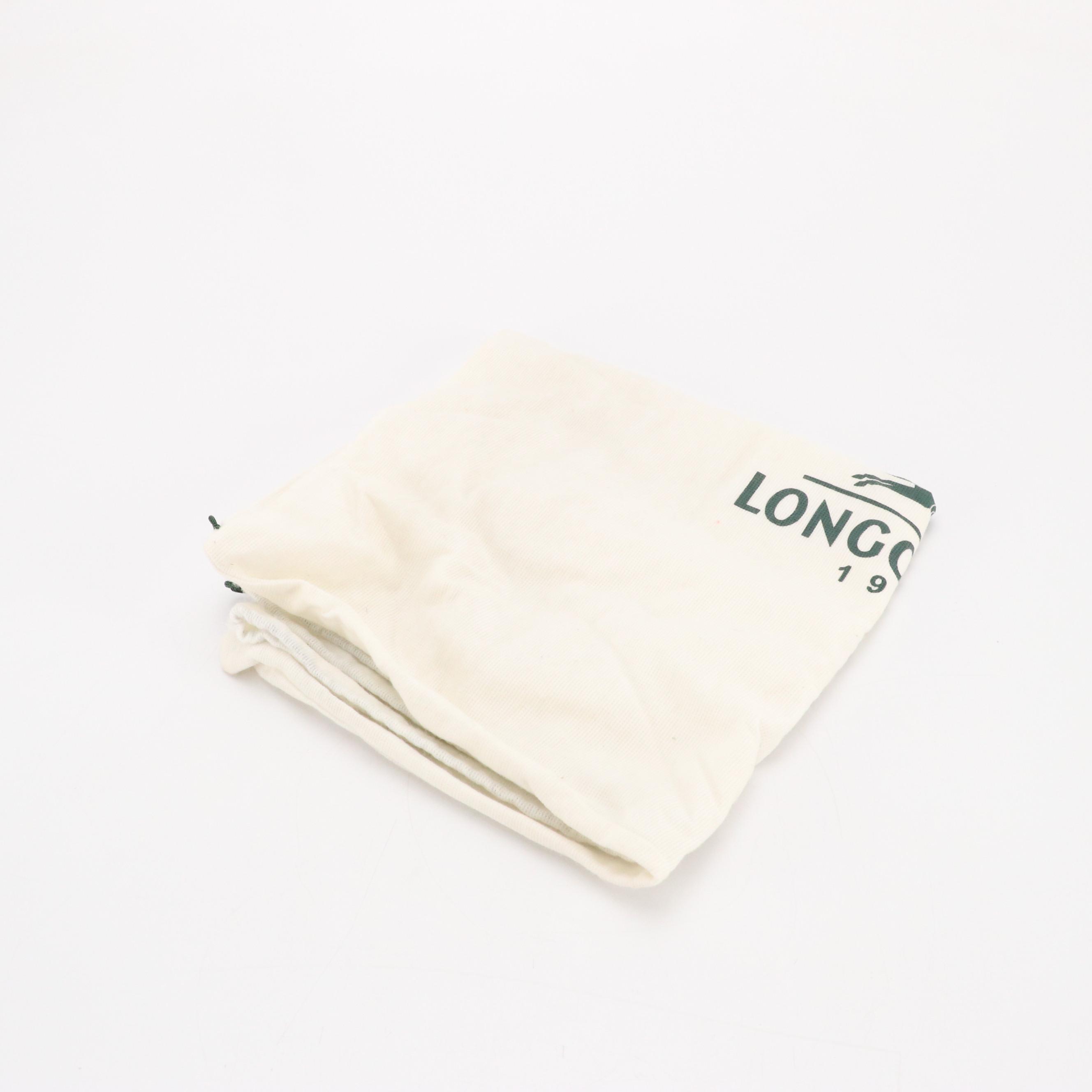 Longchamp Zippered Handbag in Shimmery Red Calfskin Leather