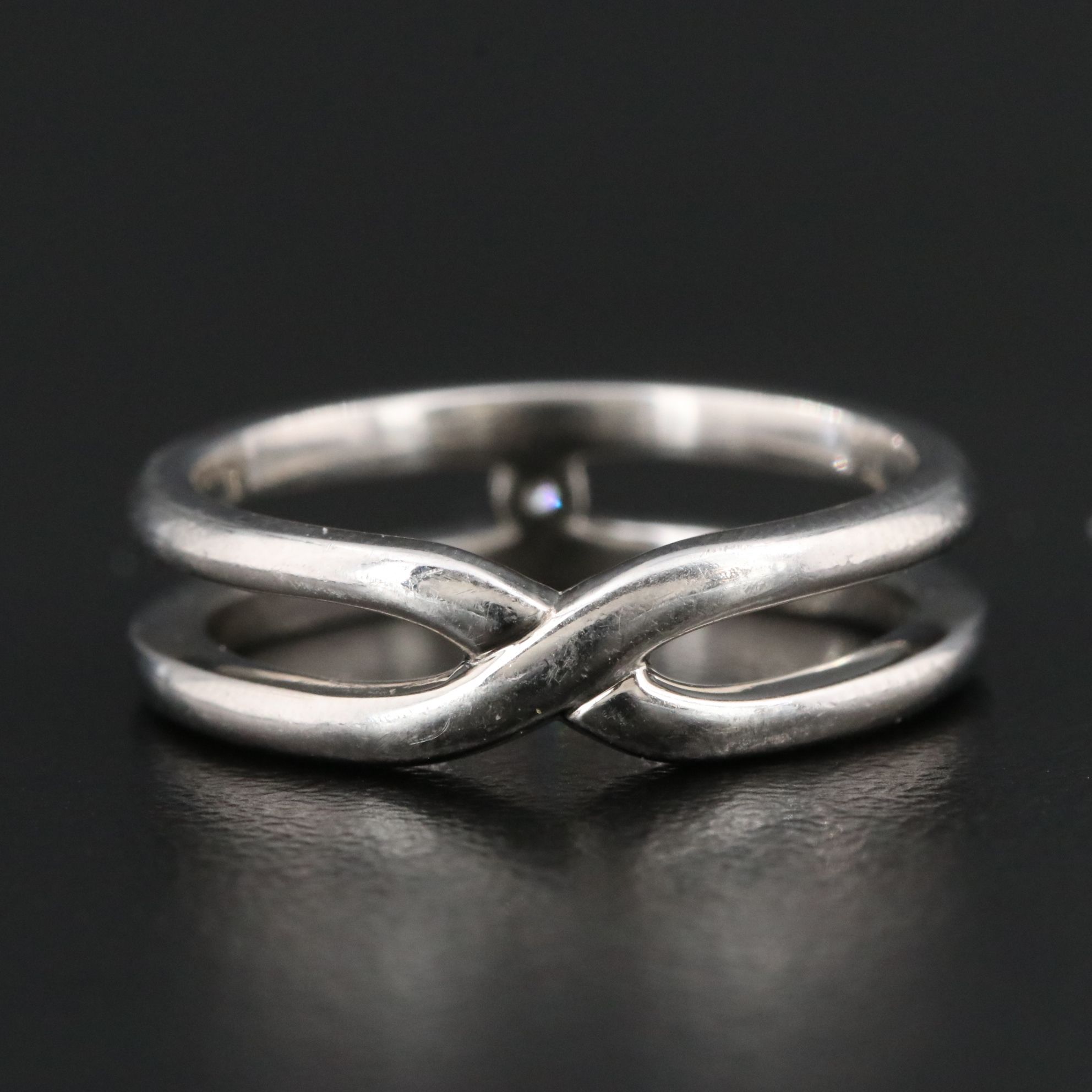 Celine Platinum Crossover Ring with Diamond Accent