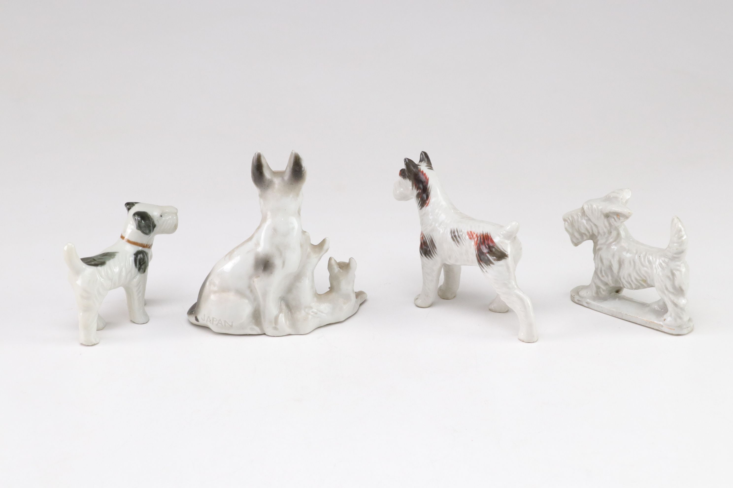 Japanese Porcelain Dog Figurine Collection