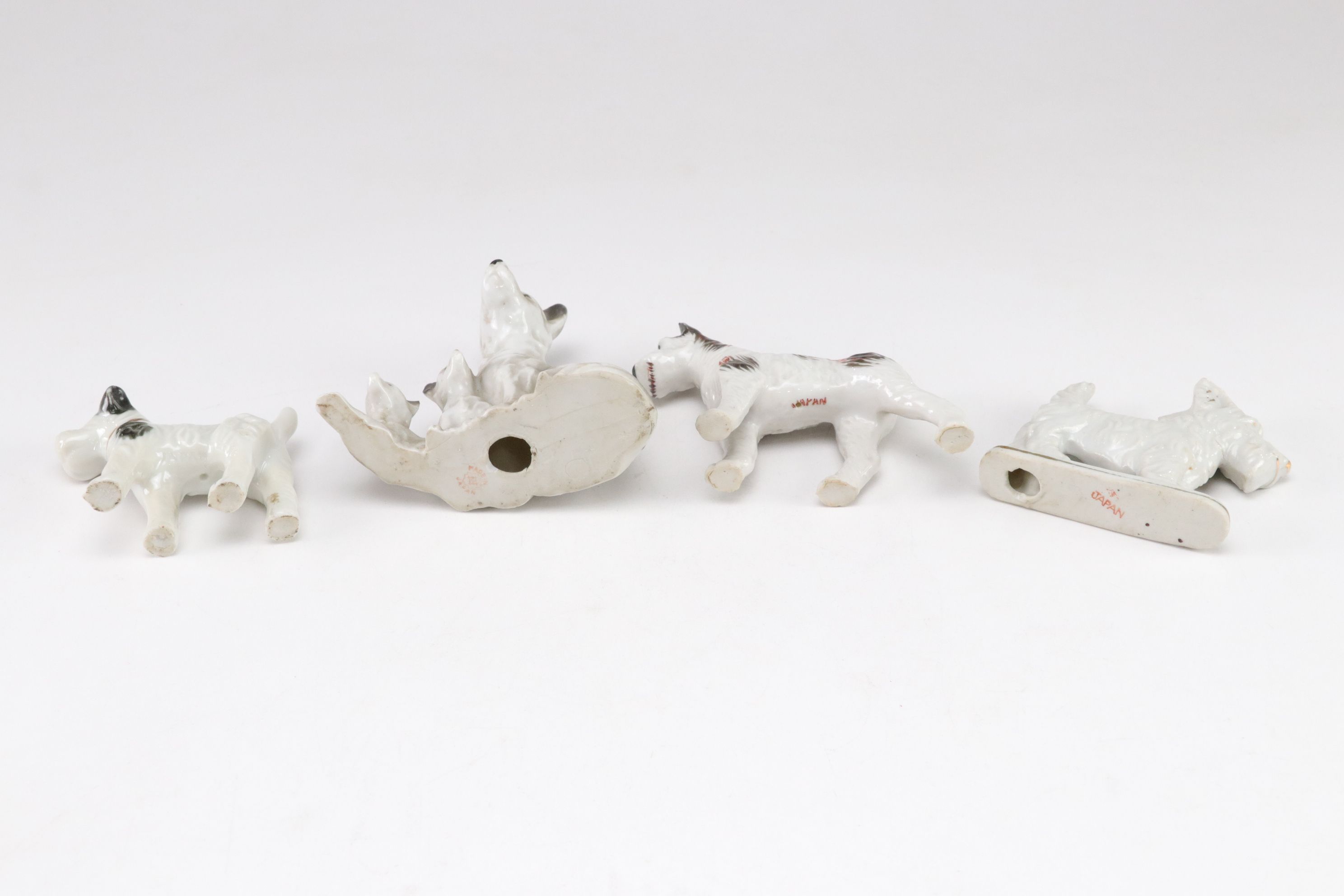 Japanese Porcelain Dog Figurine Collection