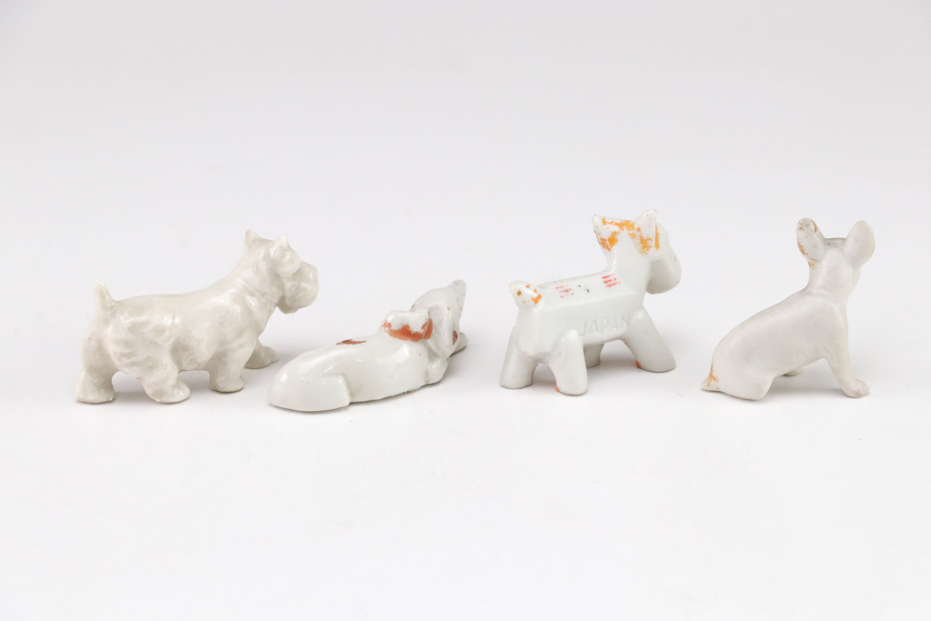 Japanese Porcelain Dog Figurine Collection
