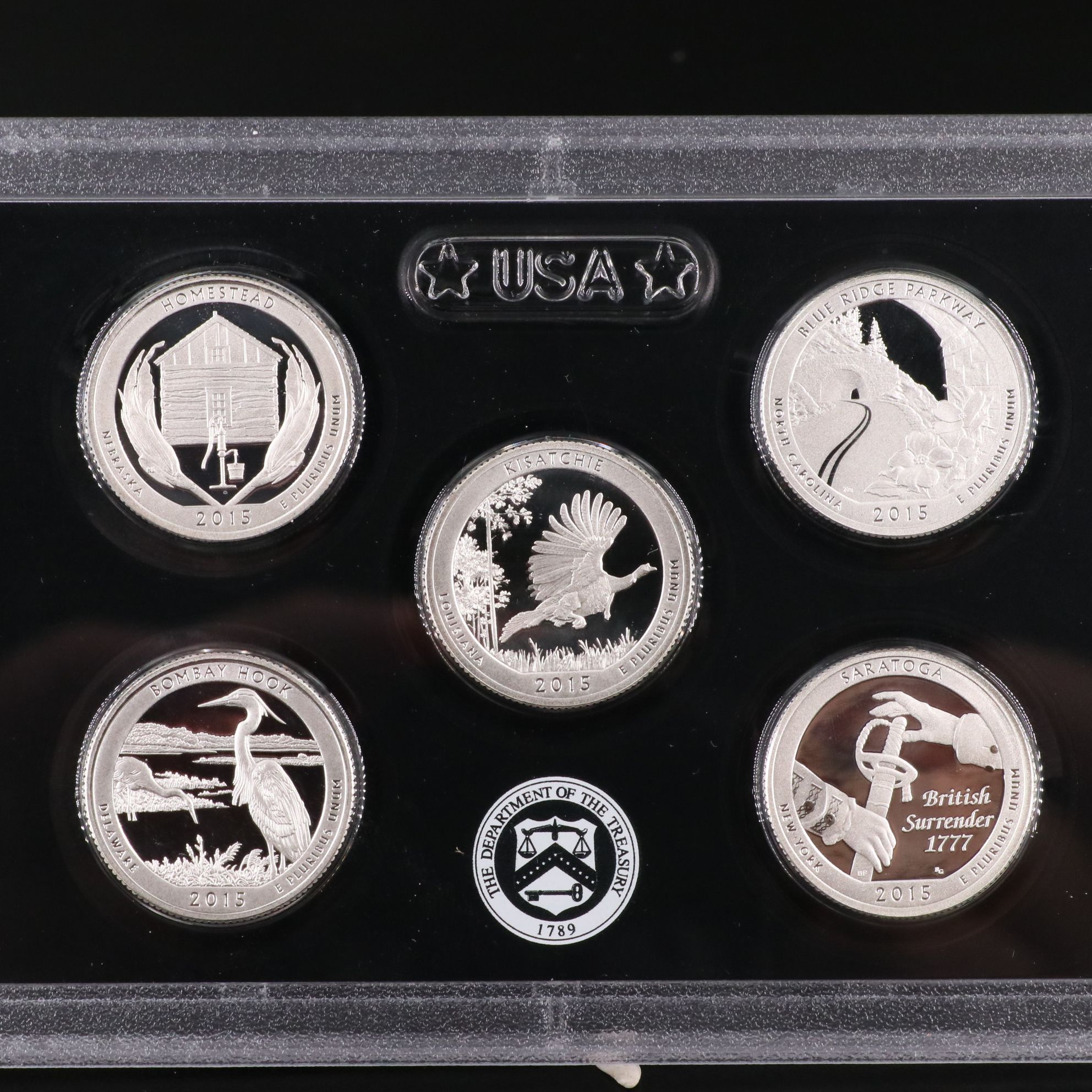 Two U.S. Mint Silver Quarter Proof Sets Including 2012 and 2015