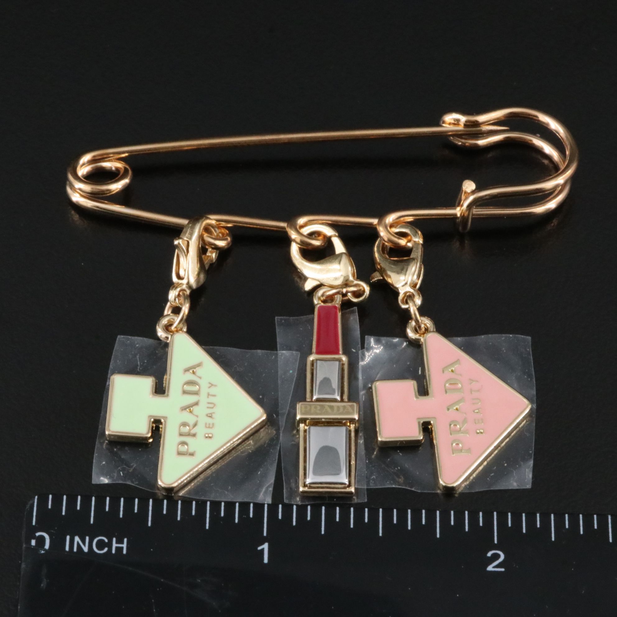 Prada Beauty Safety Pin with Charms