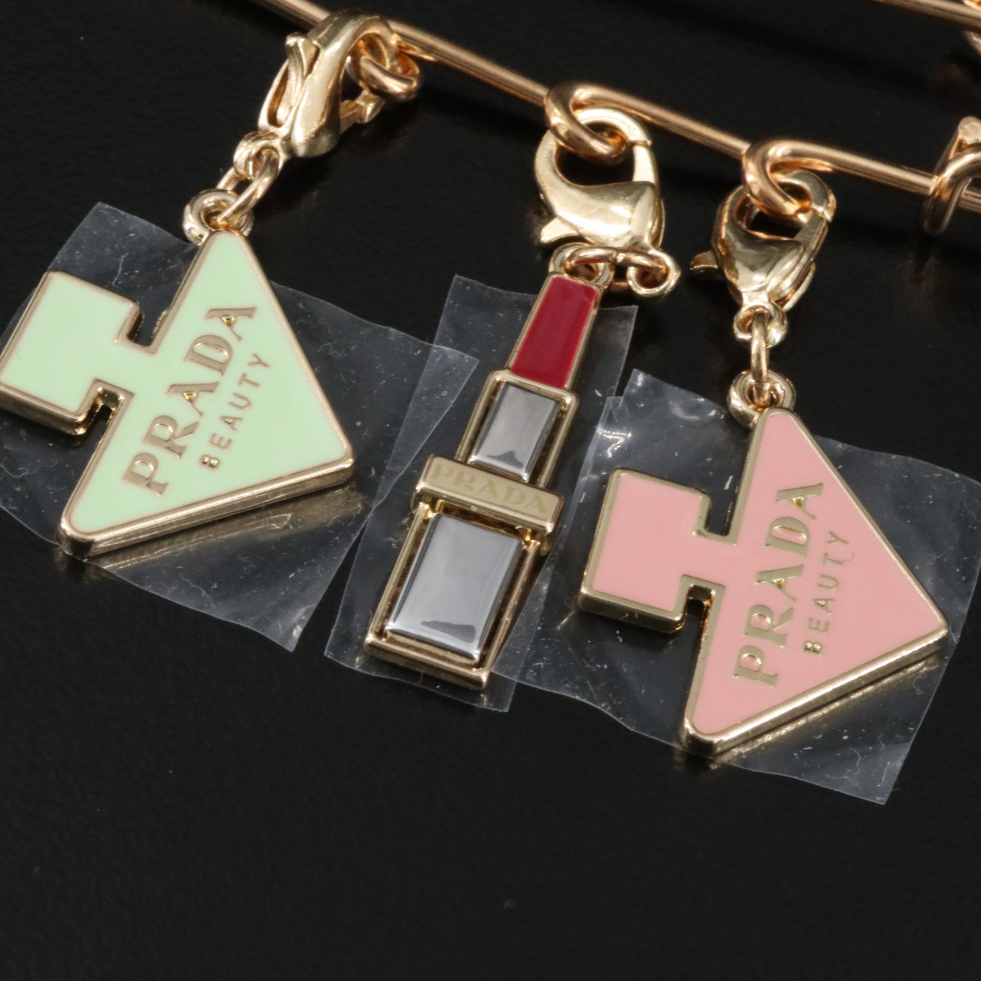 Prada Beauty Safety Pin with Charms