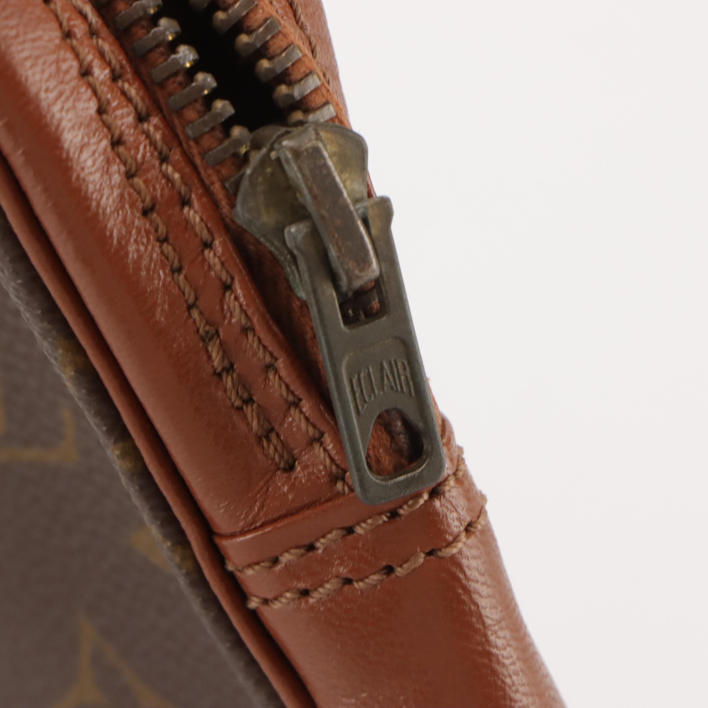 Louis Vuitton Pochette Sport Wristlet in Monogram Canvas