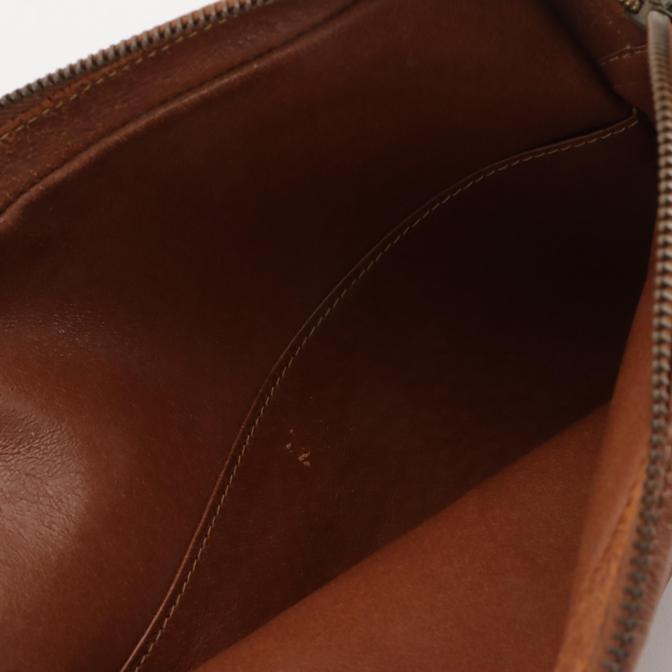 Louis Vuitton Pochette Sport Wristlet in Monogram Canvas