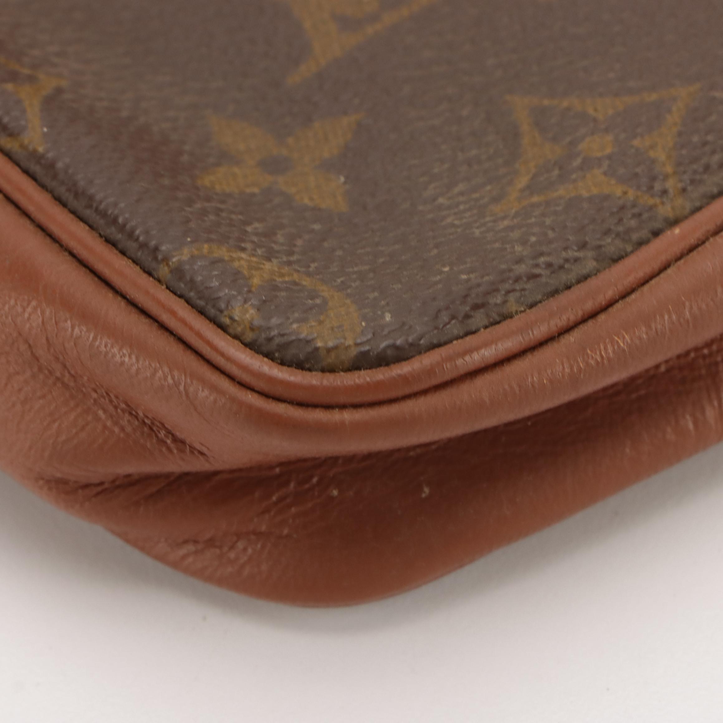 Louis Vuitton Pochette Sport Wristlet in Monogram Canvas