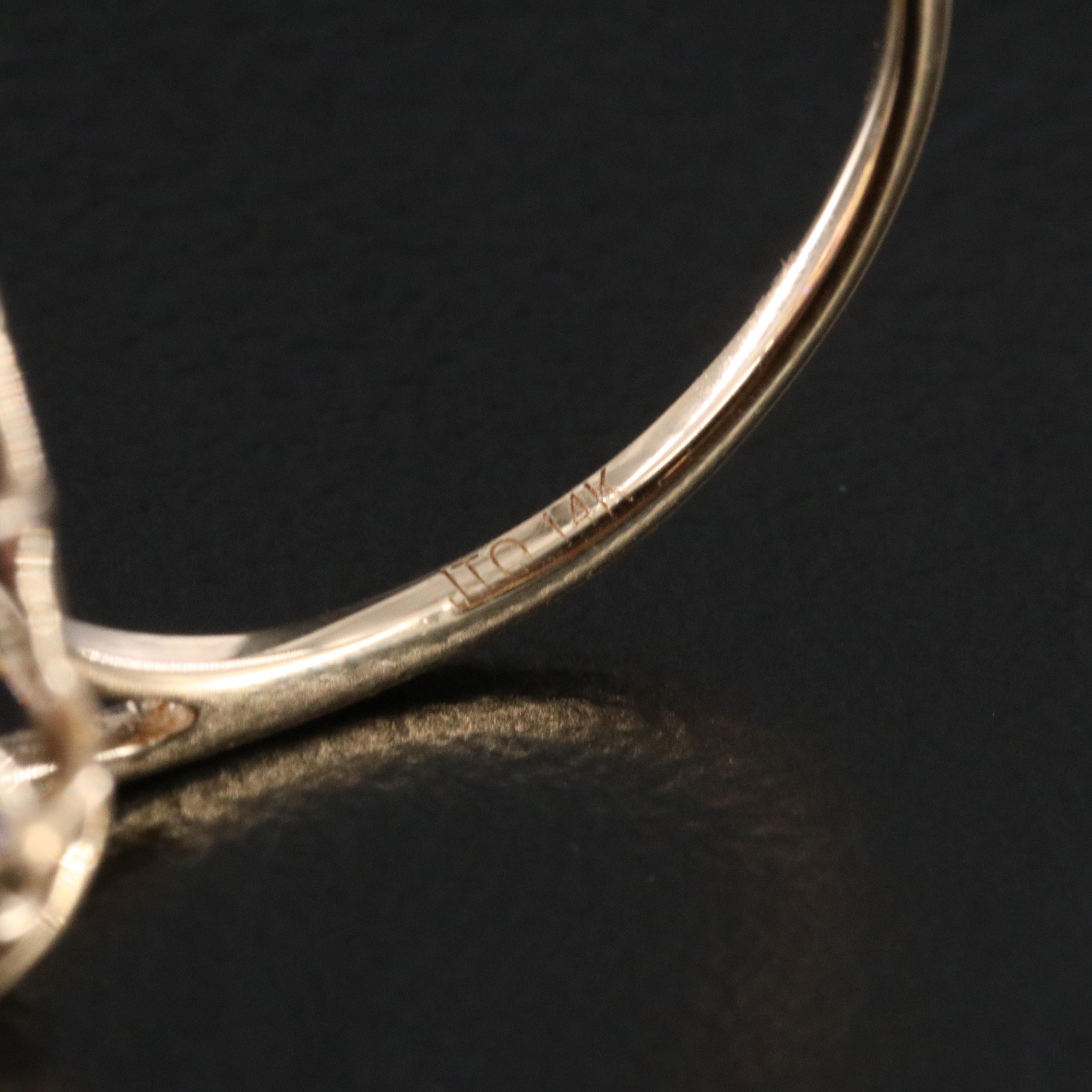 14K Tourmaline, Tanzanite and White Sapphire Ring