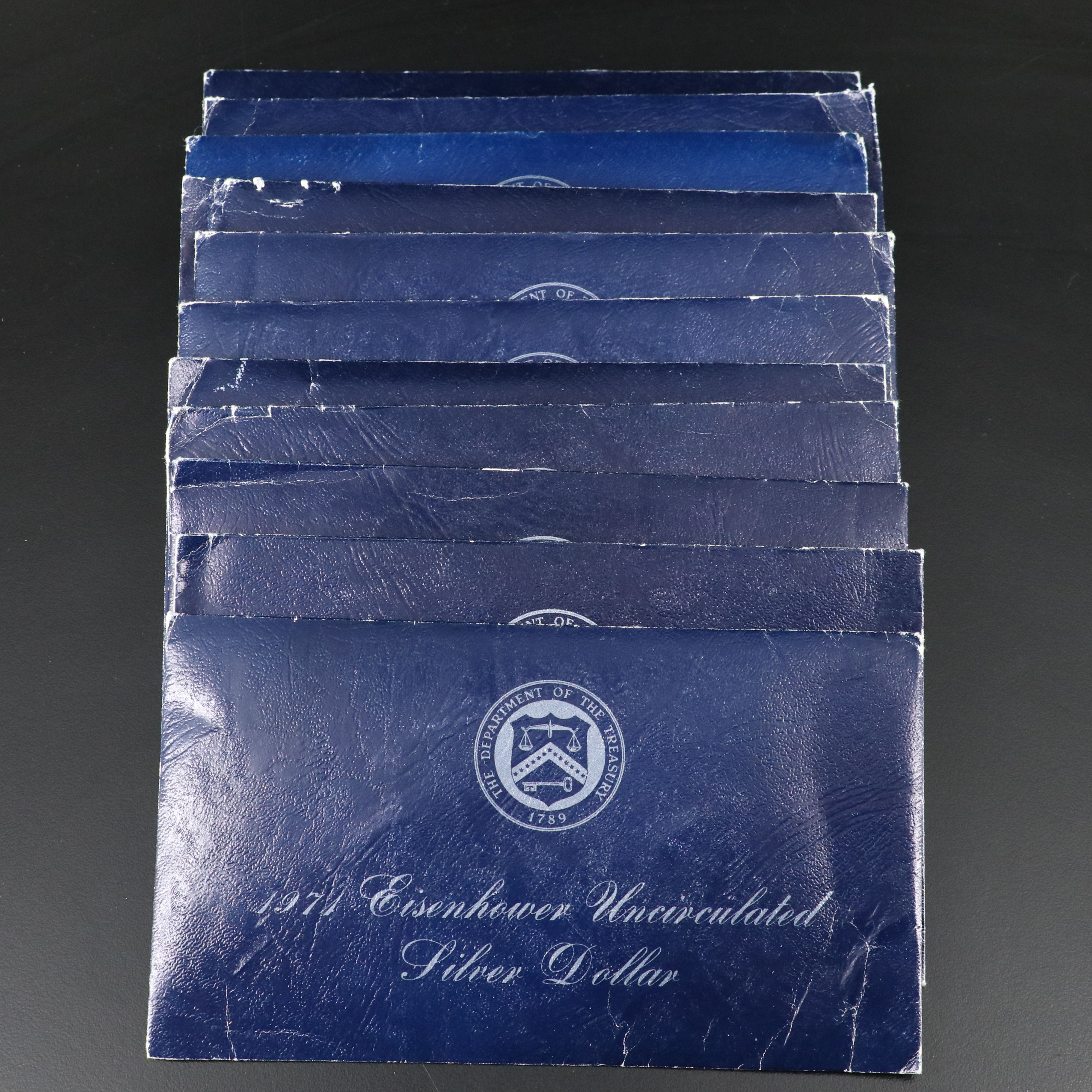 Eleven 1971-S Uncirculated Eisenhower Silver Dollars