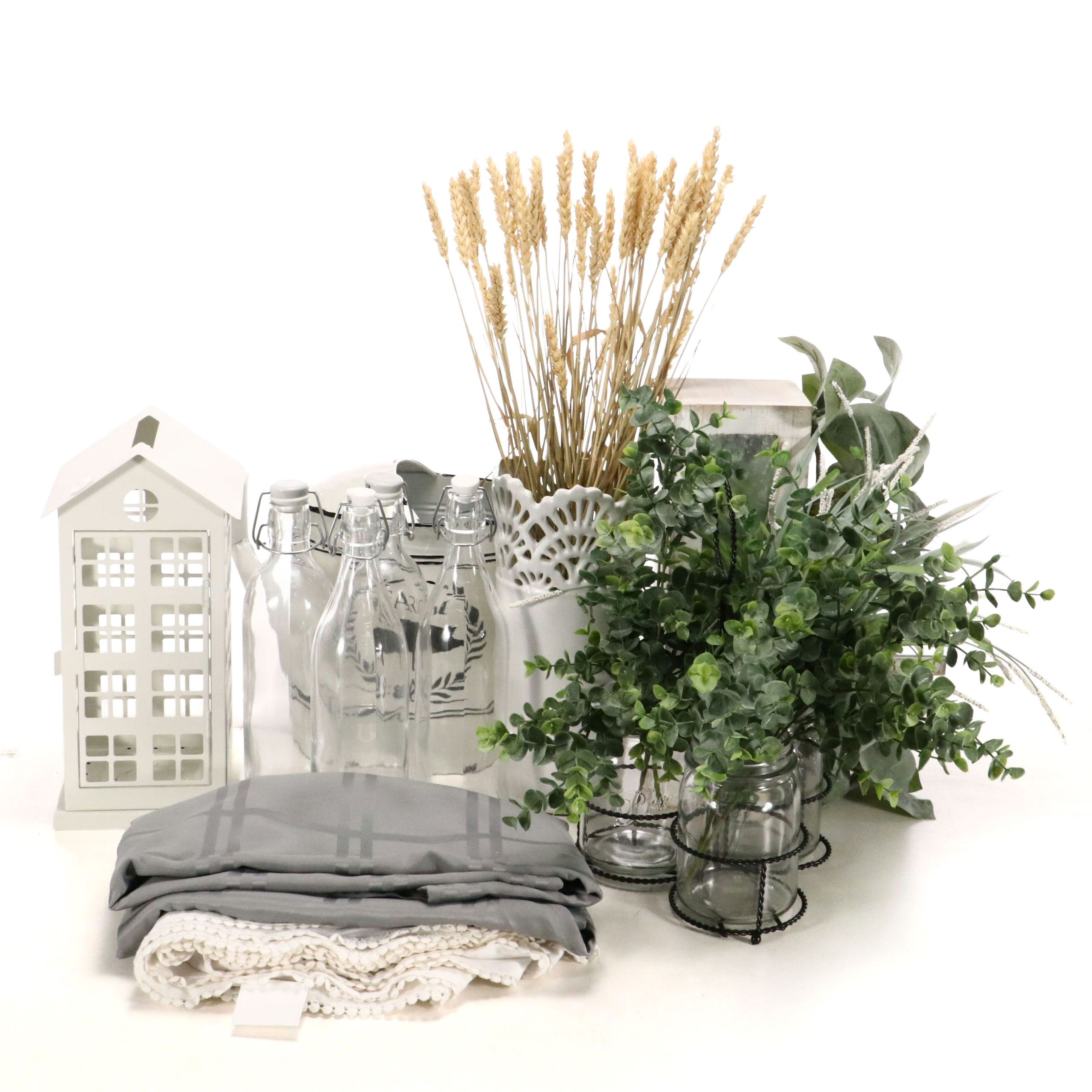 Farmhouse Aesthetic Faux Plants with Tablecloths and Other Décor Items
