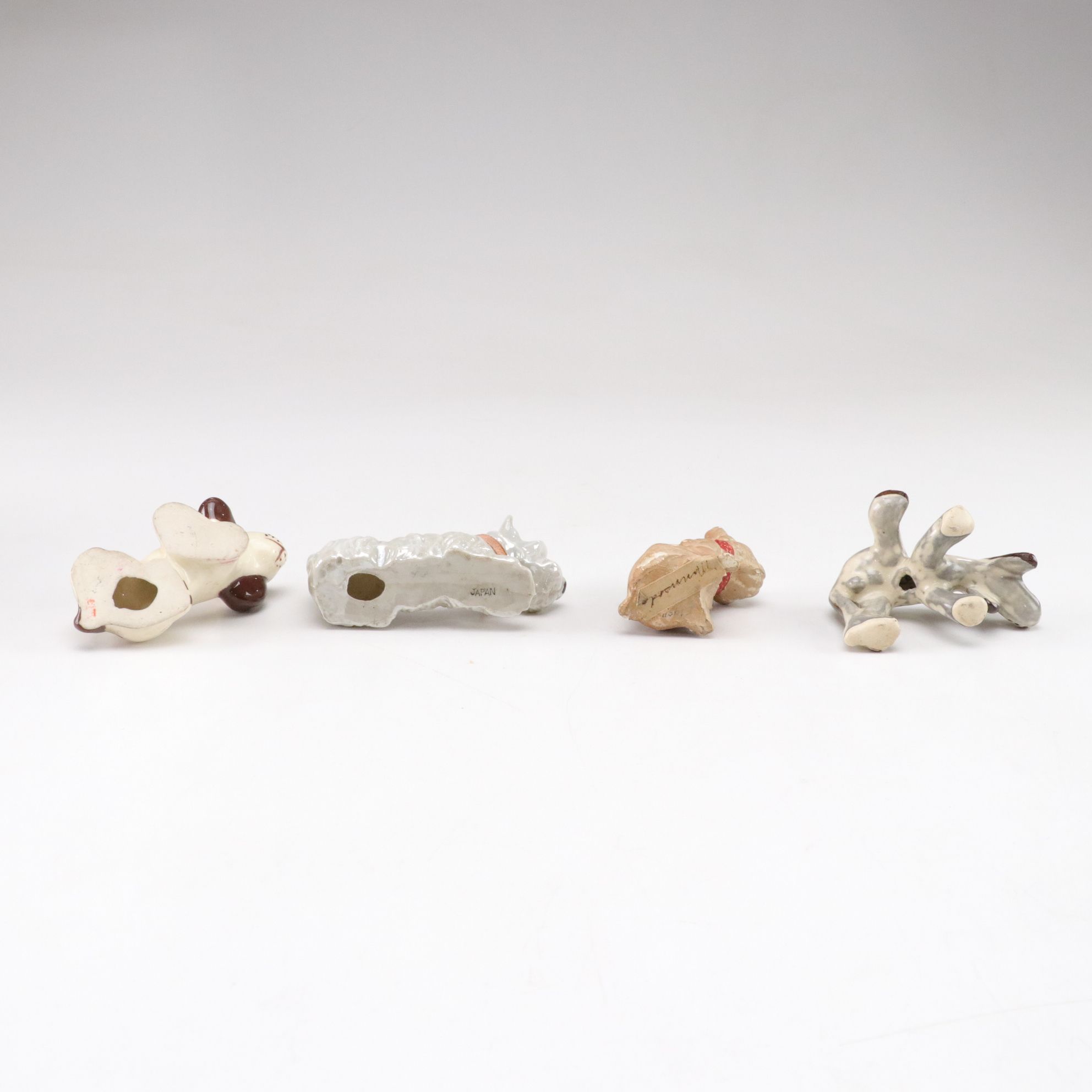 Hand-Painted Japanese Porcelain Dog Figurines