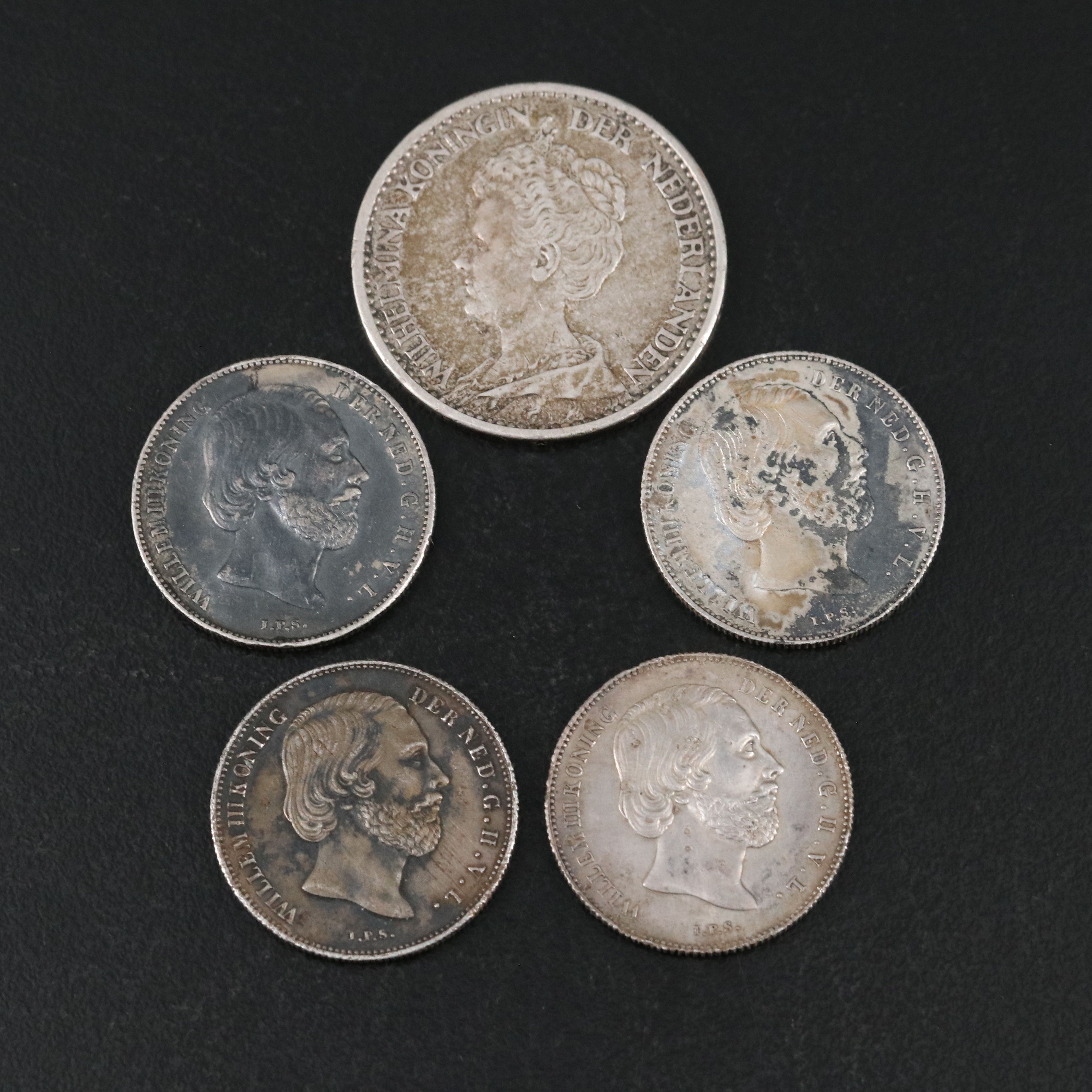 Four Netherlands One Half Gulden Silver Coins With a 1914 Netherlands One Gulden