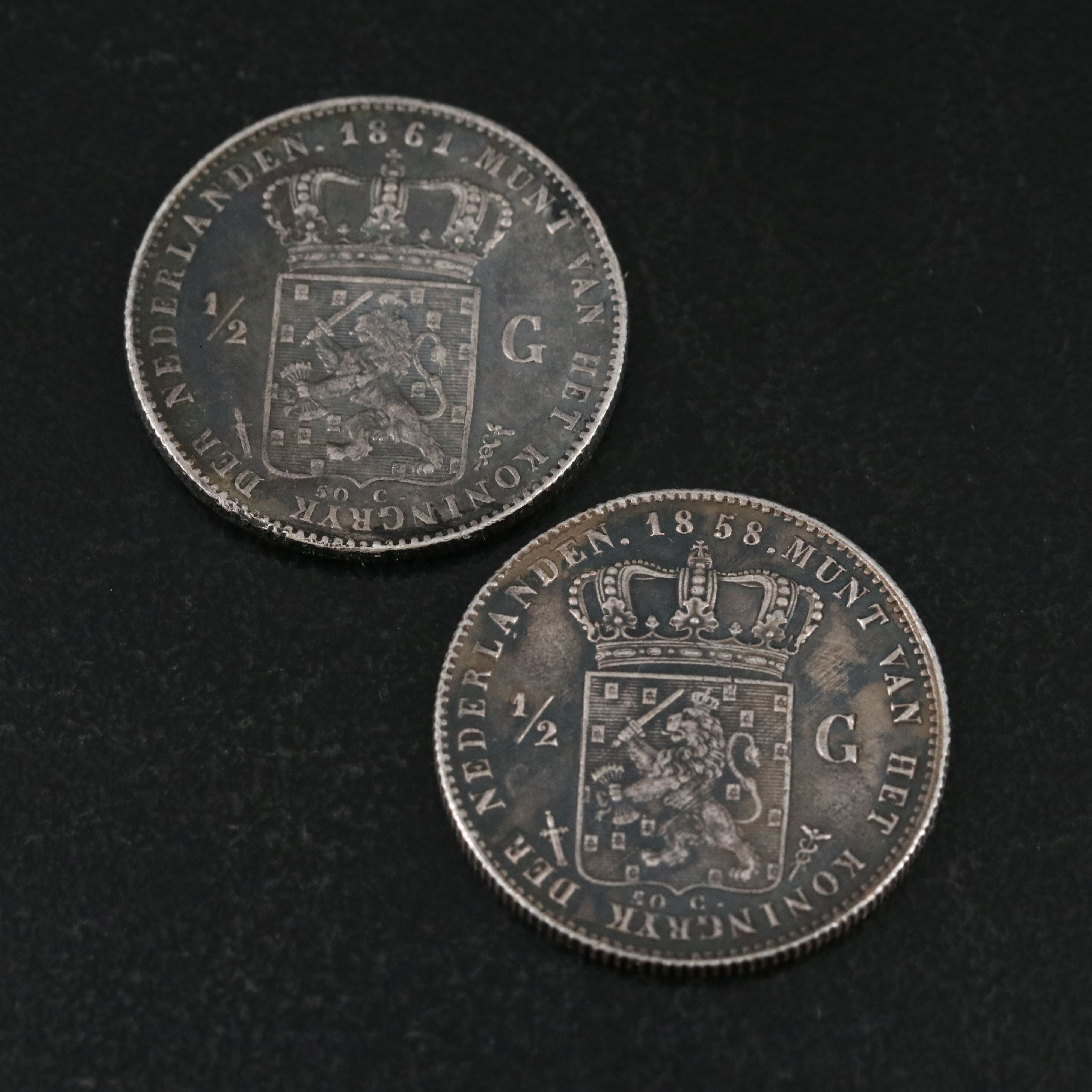 Four Netherlands One Half Gulden Silver Coins With a 1914 Netherlands One Gulden