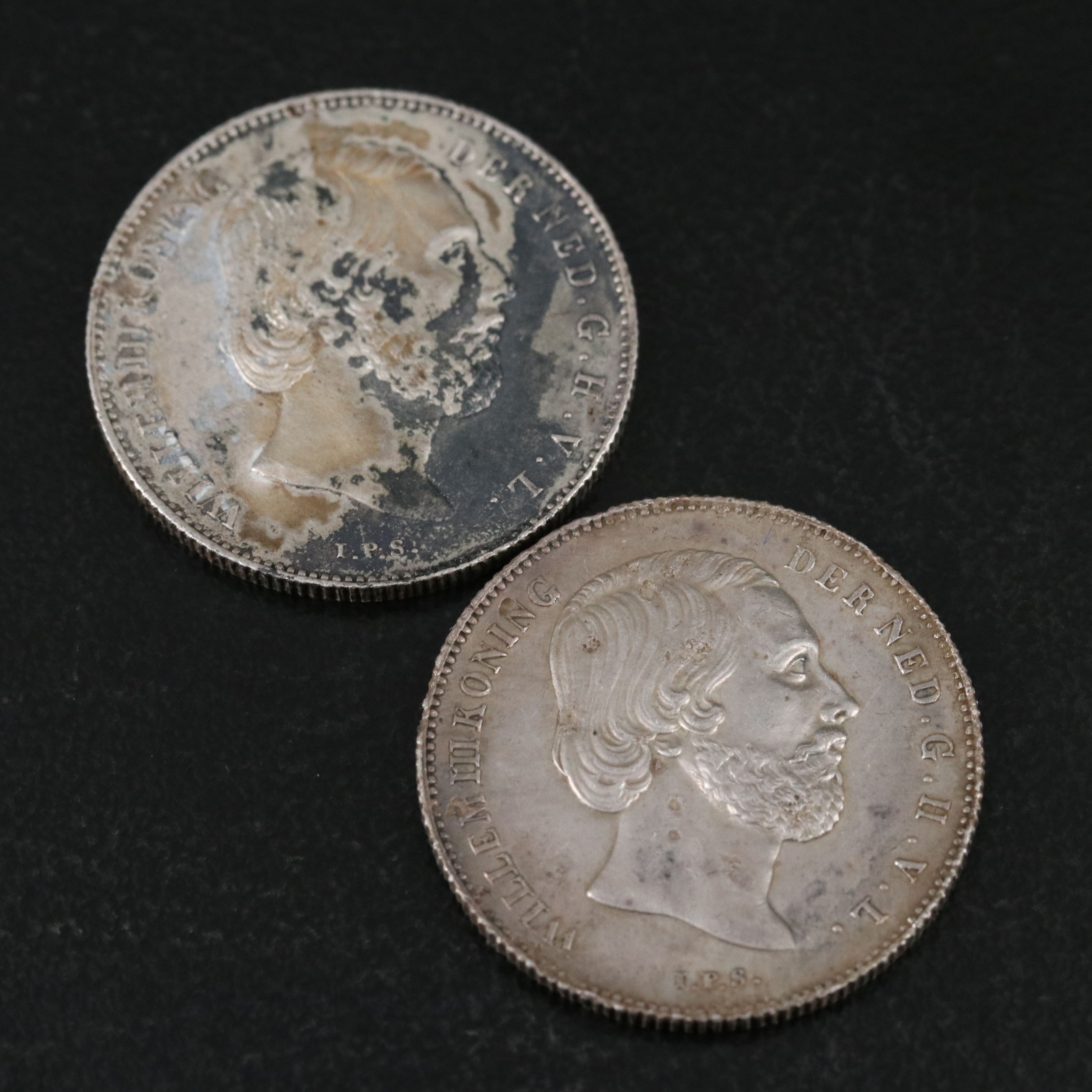 Four Netherlands One Half Gulden Silver Coins With a 1914 Netherlands One Gulden