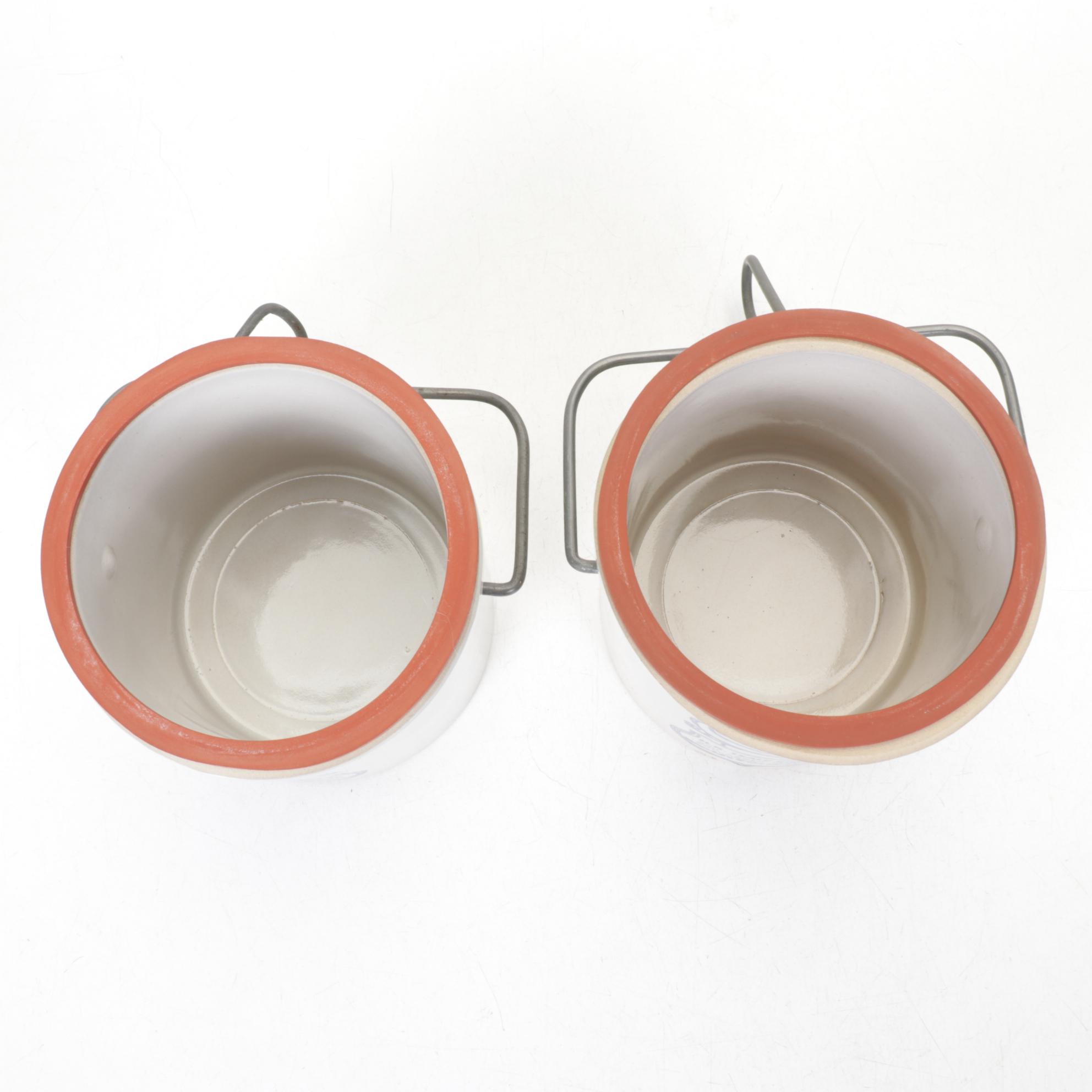 Henry McKenna Jug with Williamsburg Pitcher and Other Stoneware Crocks