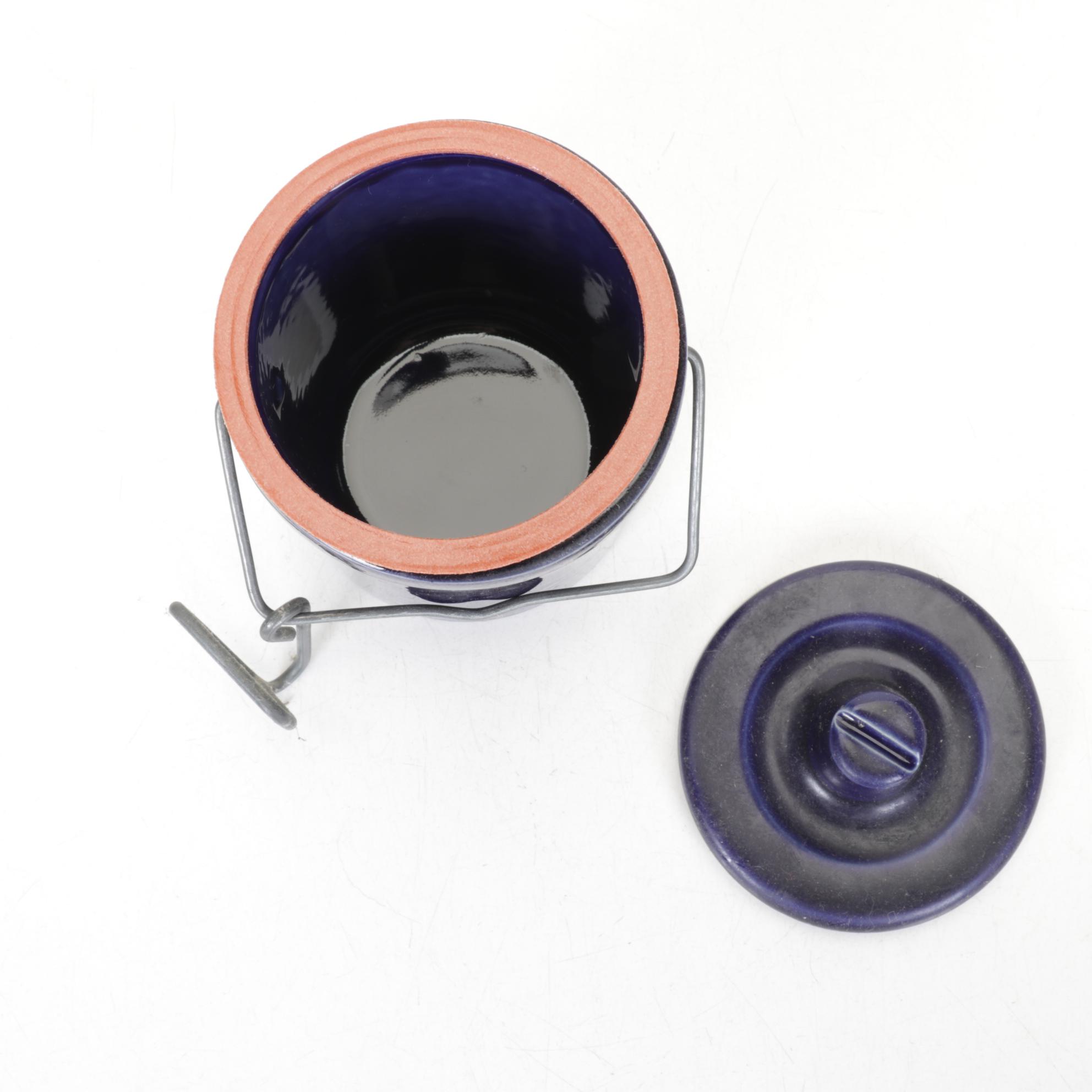 Henry McKenna Jug with Williamsburg Pitcher and Other Stoneware Crocks