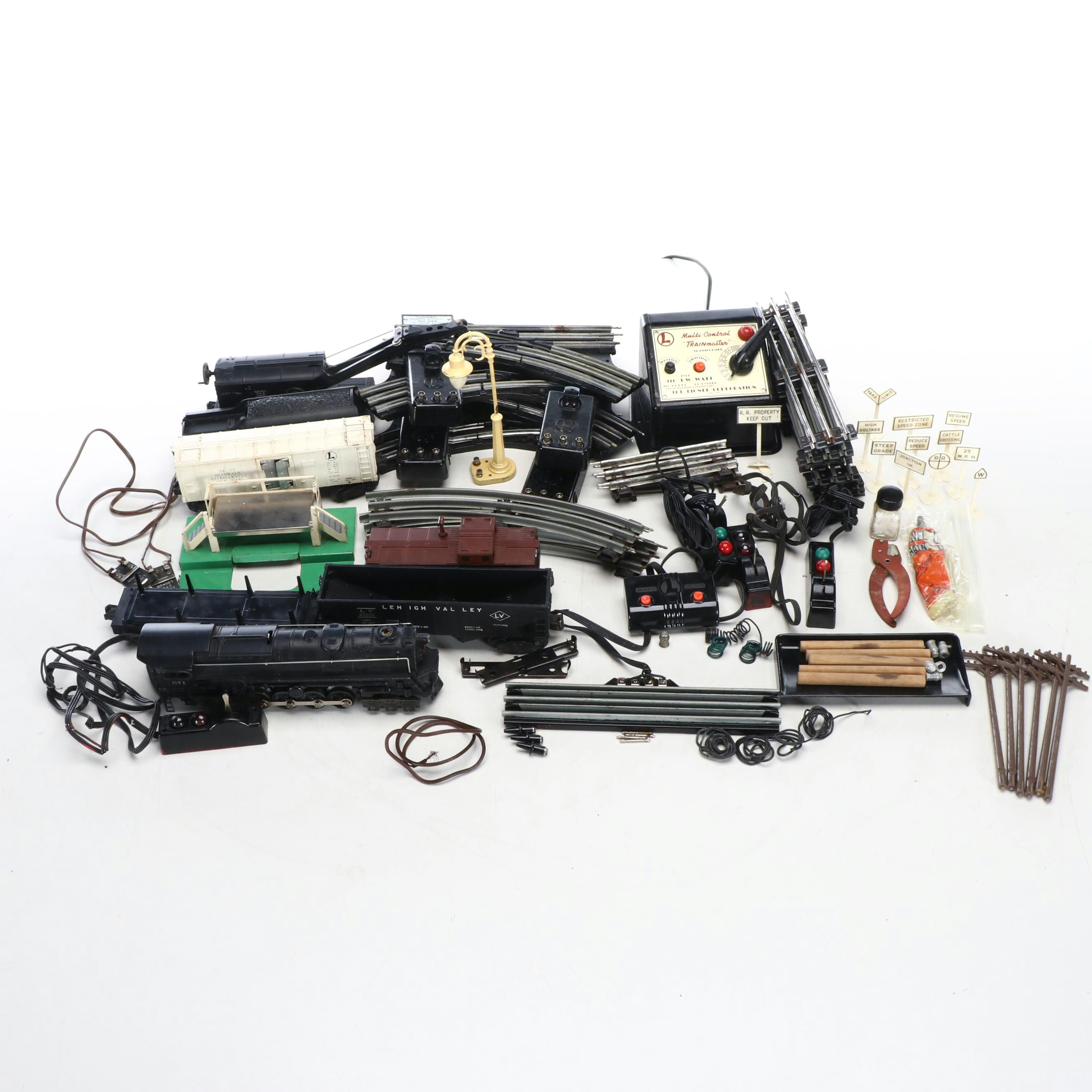 Lionel Train Cars with Assortment of Tracks