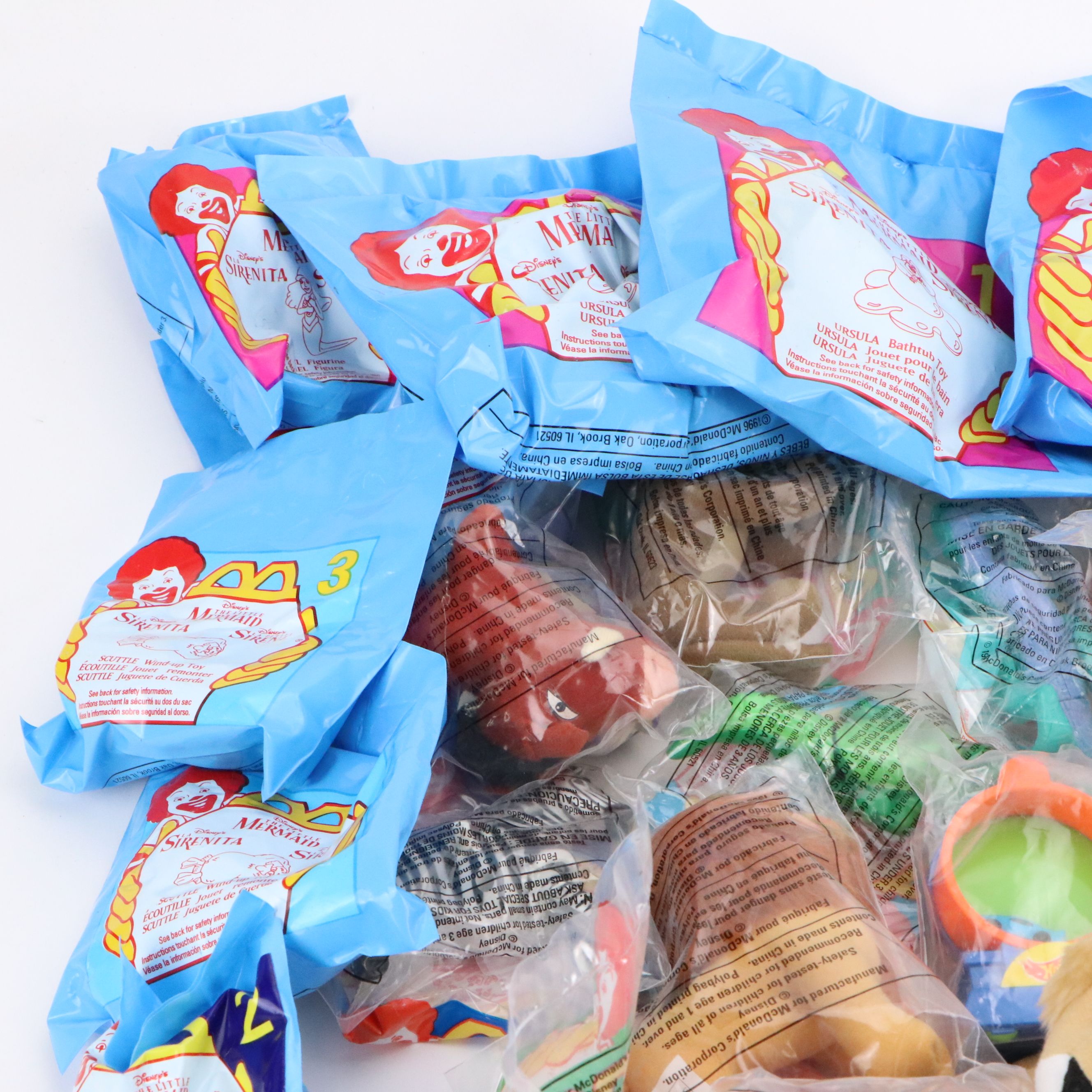 McDonald's Happy Meal Disney Movie Dolls, "Lion King II" Plush Toys and More