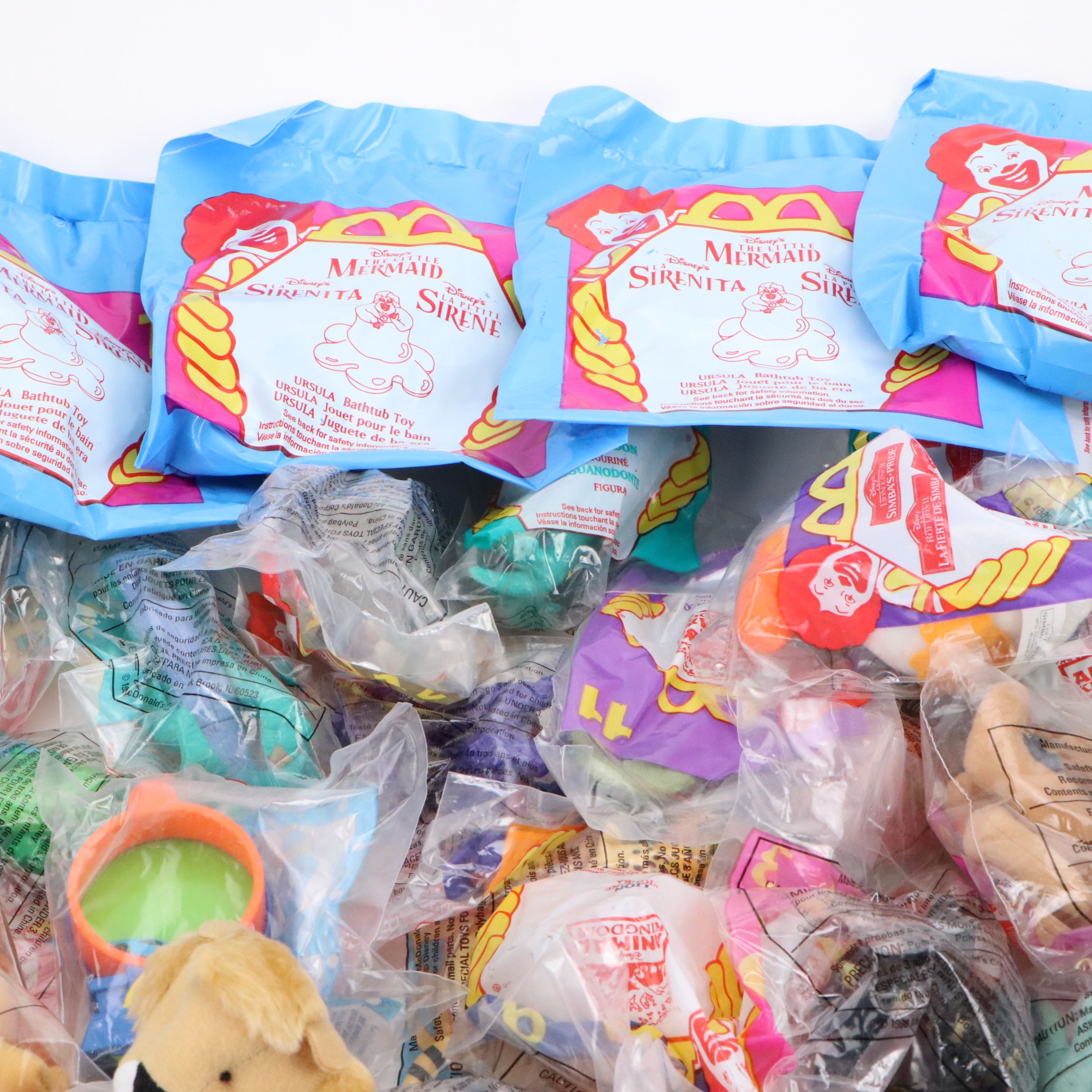 McDonald's Happy Meal Disney Movie Dolls, "Lion King II" Plush Toys and More