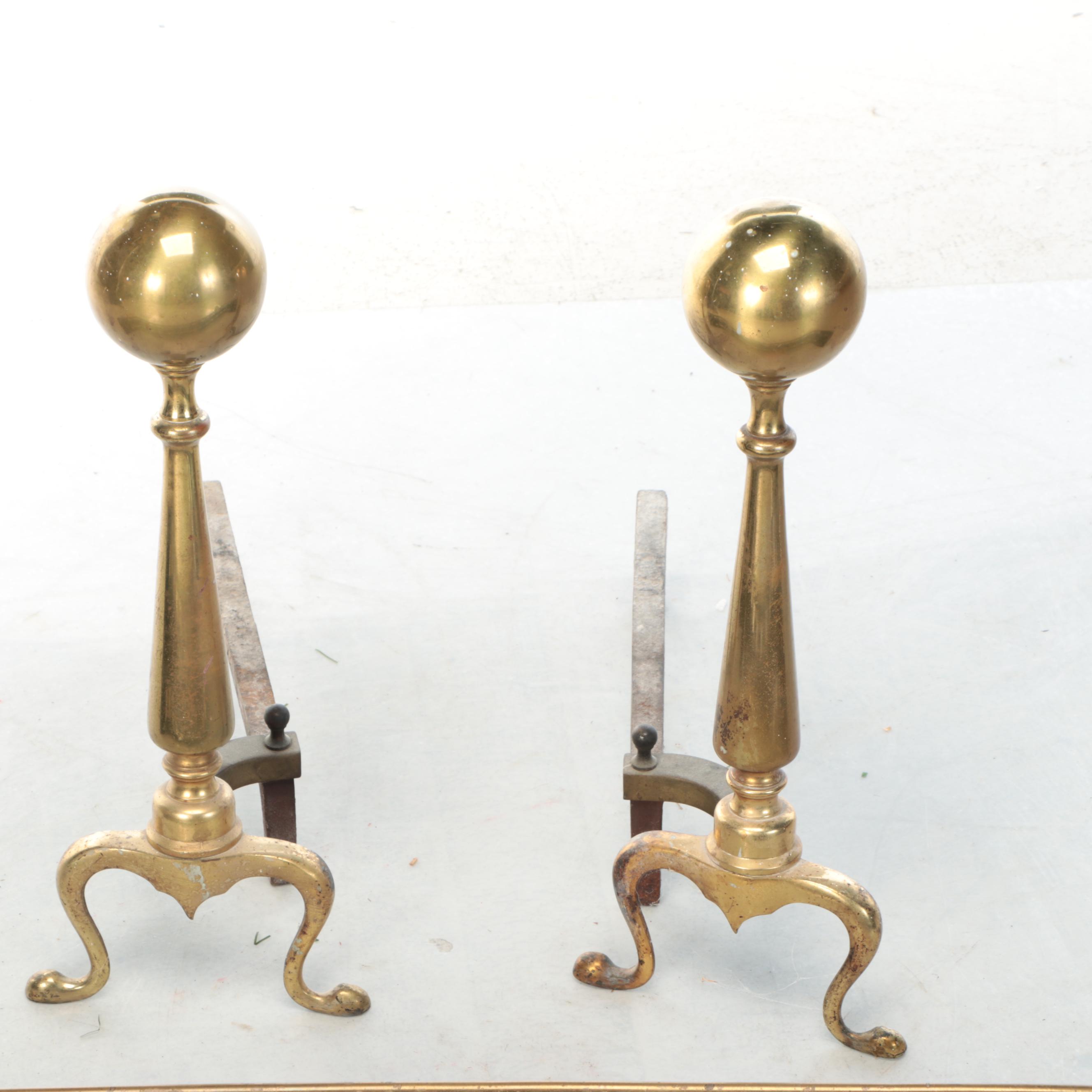 Chippendale Style Brass Cannonball Andirons with Pierced Metal Fender