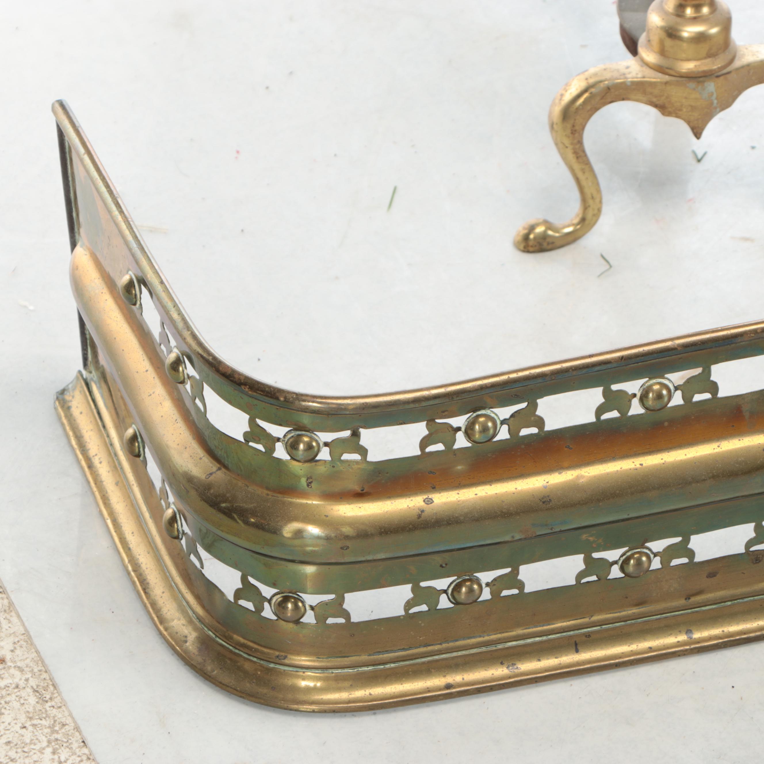 Chippendale Style Brass Cannonball Andirons with Pierced Metal Fender