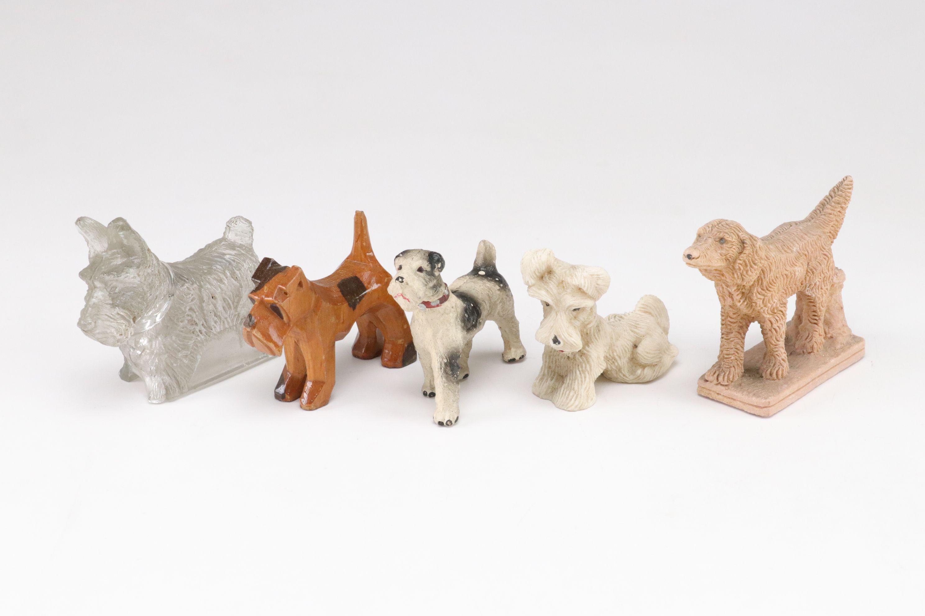 Terrier and Other Dog Figurines in Ceramic, Wood, Plastic, Glass, and Resin