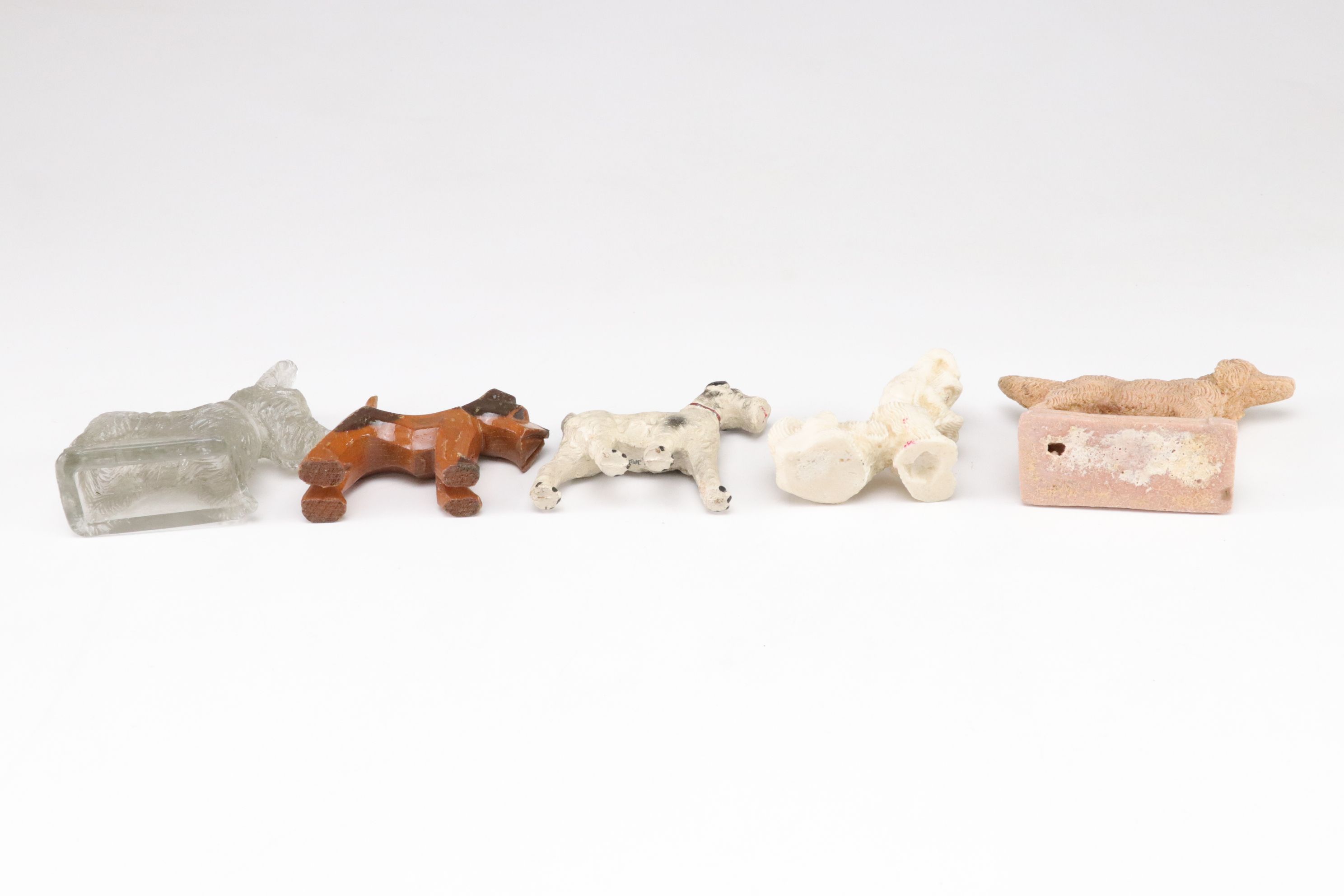 Terrier and Other Dog Figurines in Ceramic, Wood, Plastic, Glass, and Resin