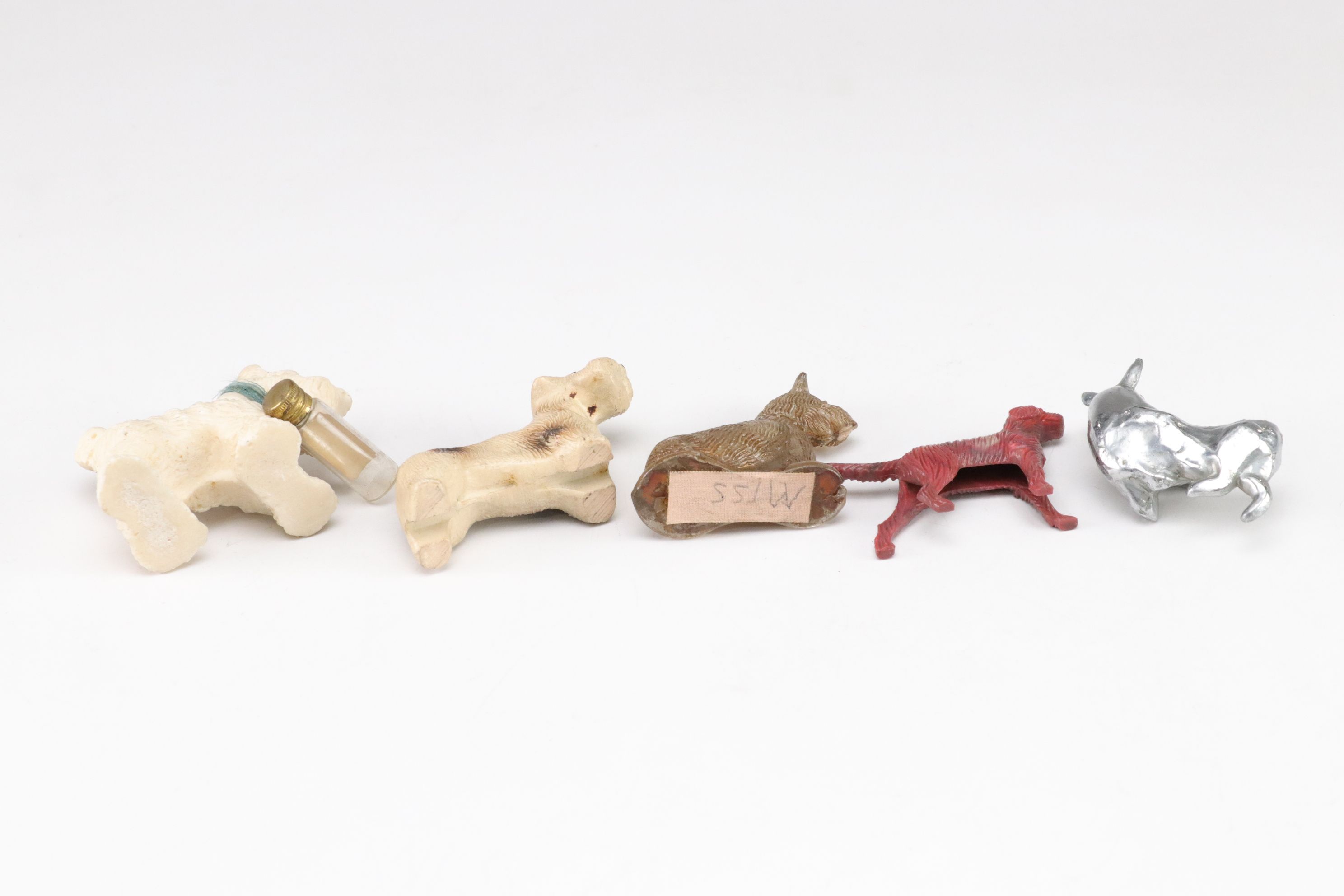 Terrier and Other Dog Figurines in Ceramic, Wood, Plastic, Glass, and Resin