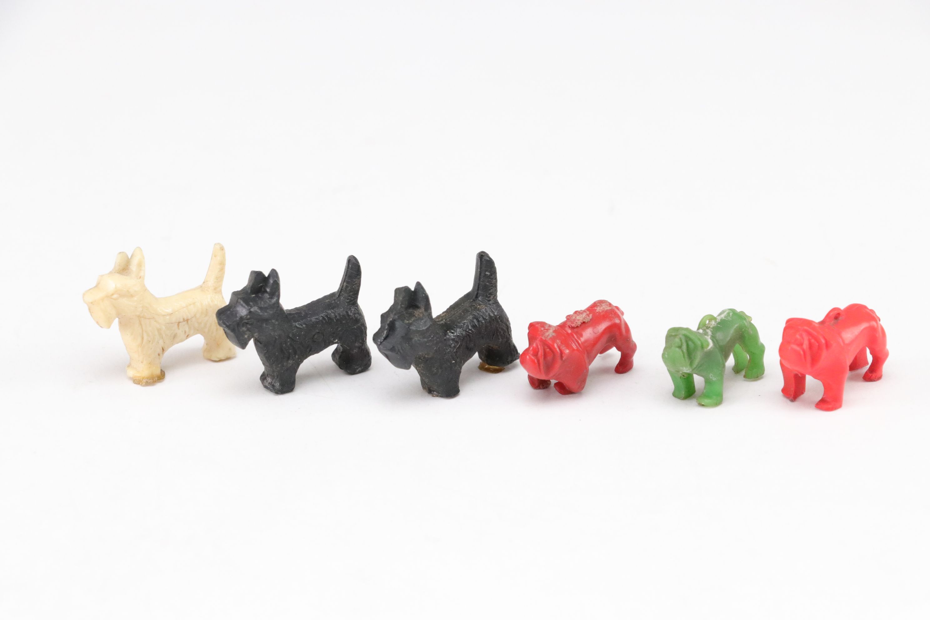 Terrier and Other Dog Figurines in Ceramic, Wood, Plastic, Glass, and Resin