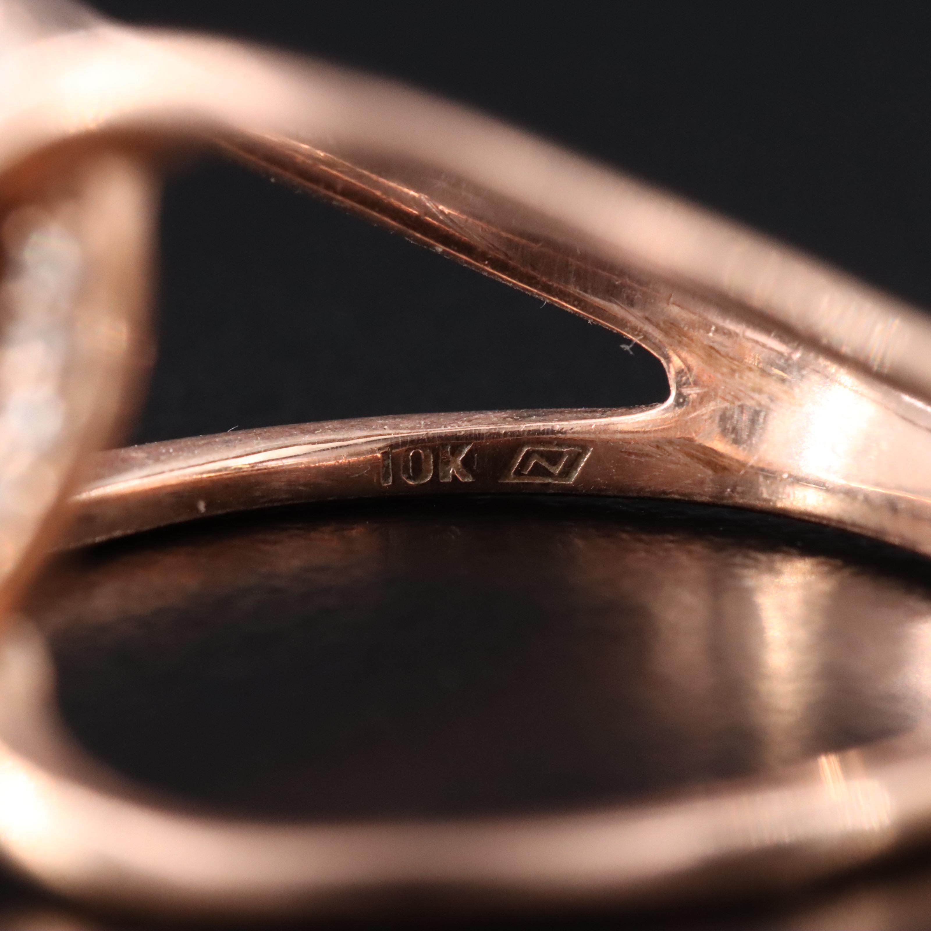 10K Rose Gold 0.13 CTW Diamond Ring with Emerald Accent