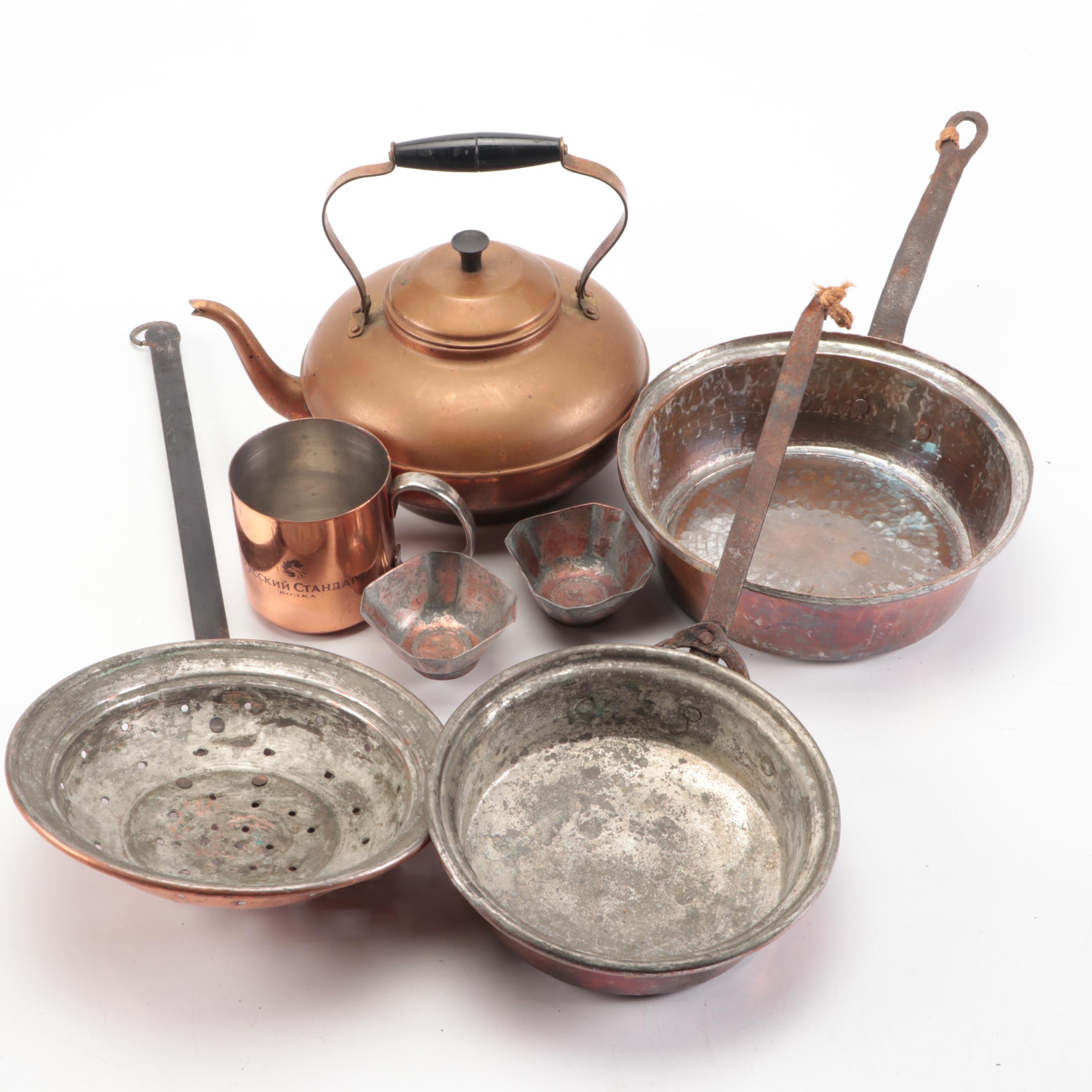 Hammered Copper Pots with Kettle and Other Tableware