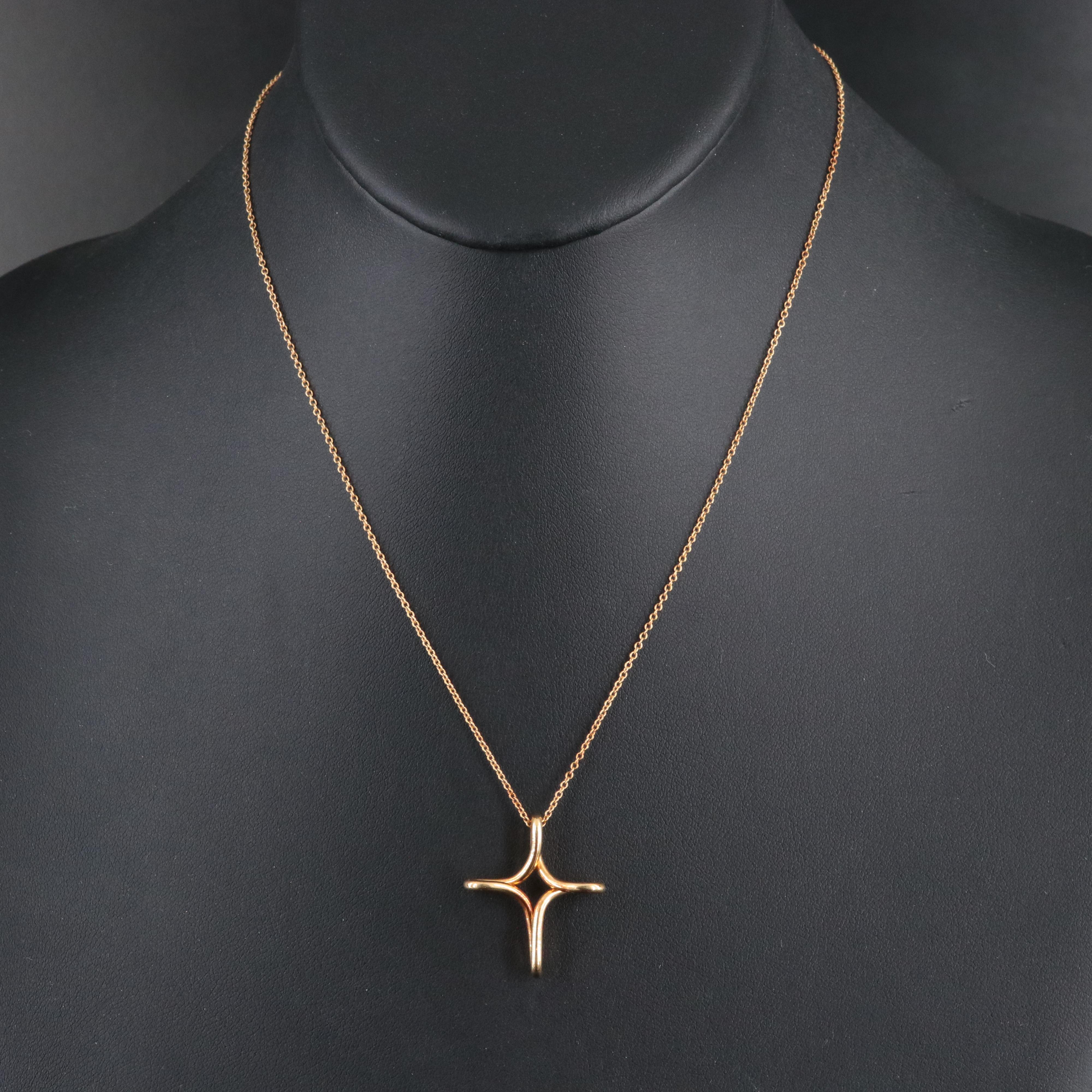 Elsa Peretti for Tiffany & Co. 18K Infinity Cross Pendant Necklace