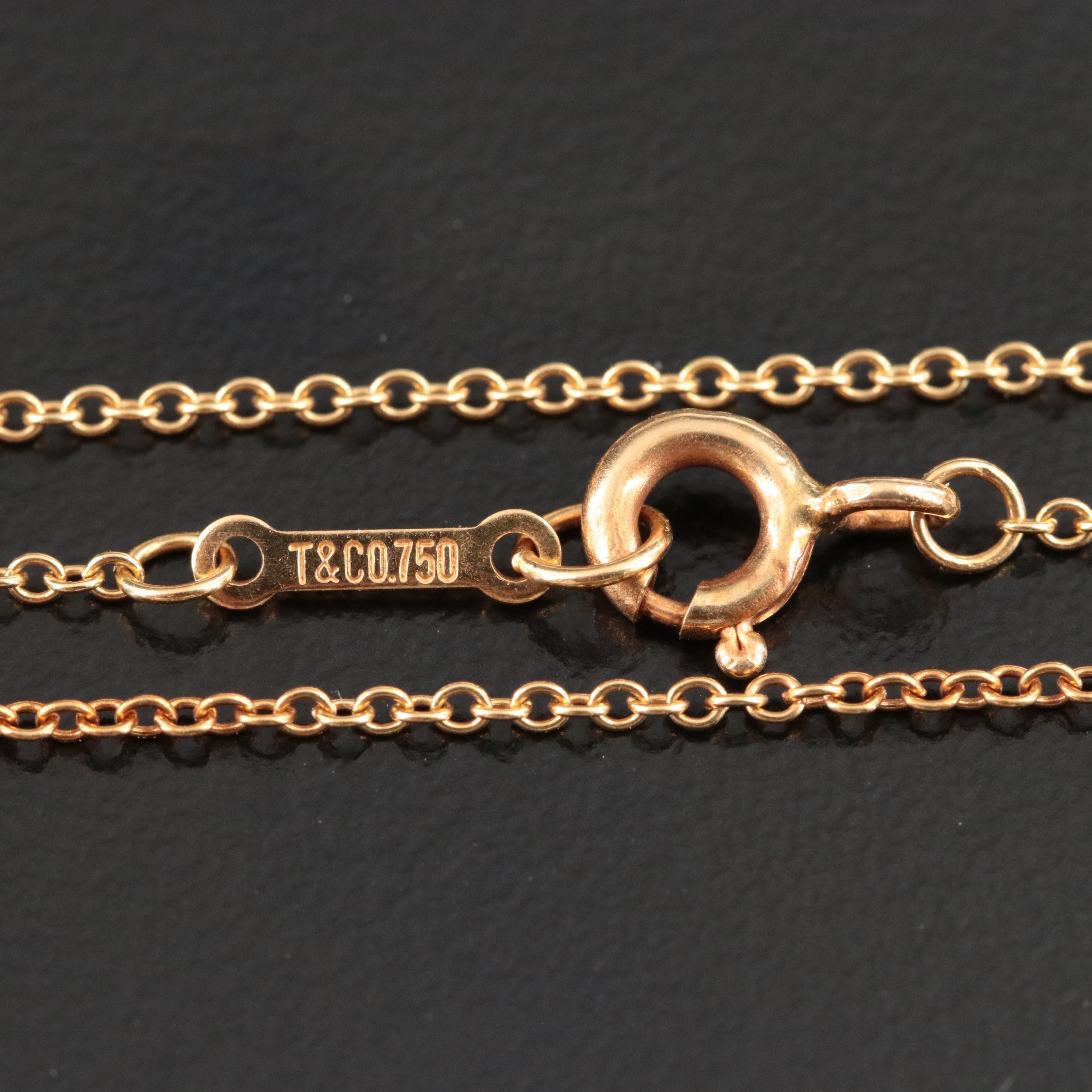 Elsa Peretti for Tiffany & Co. 18K Infinity Cross Pendant Necklace