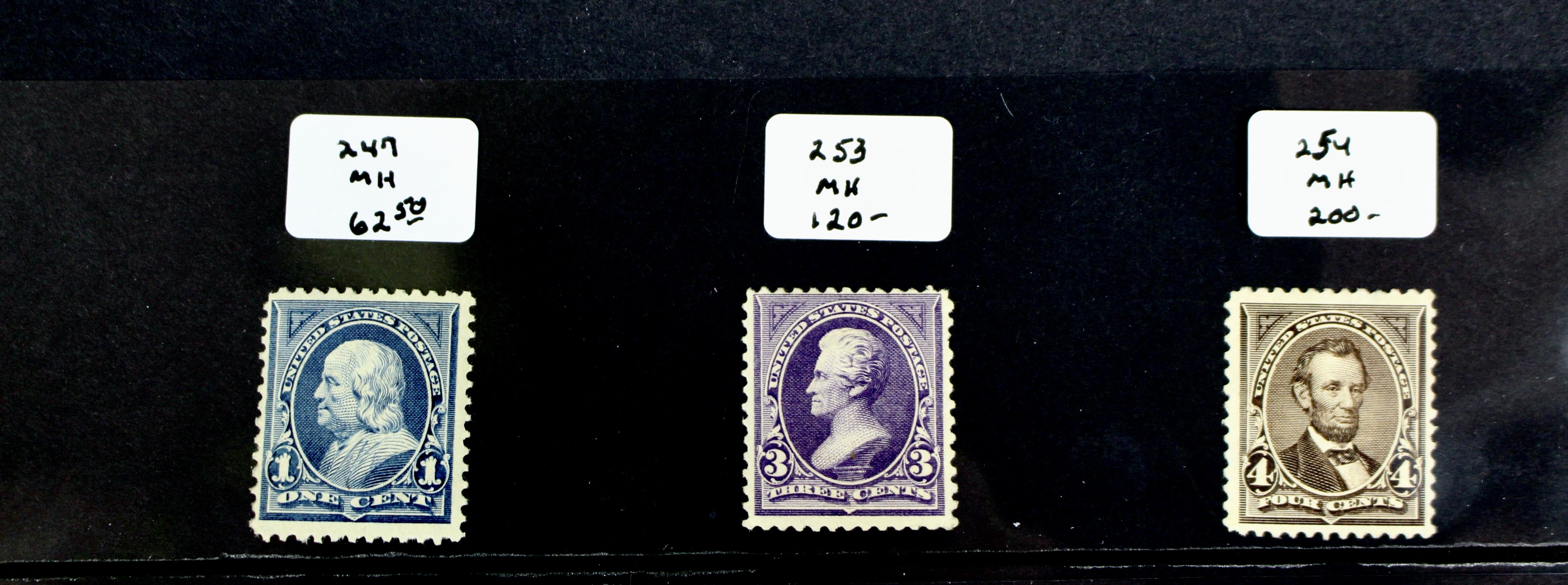 Fifteen Mint Hinged U.S. Postage Stamps, Scott 247 to 396