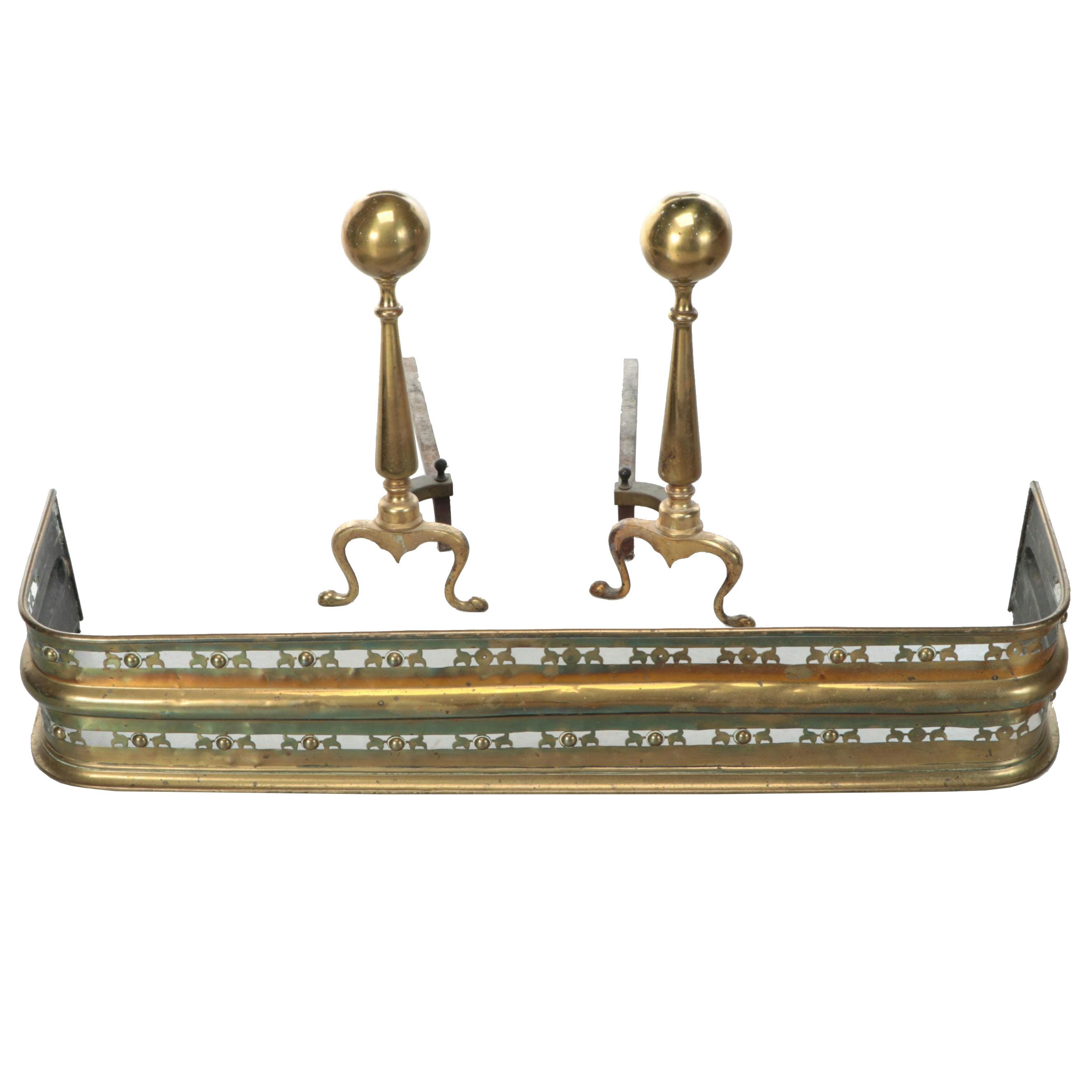 Chippendale Style Brass Cannonball Andirons with Pierced Metal Fender