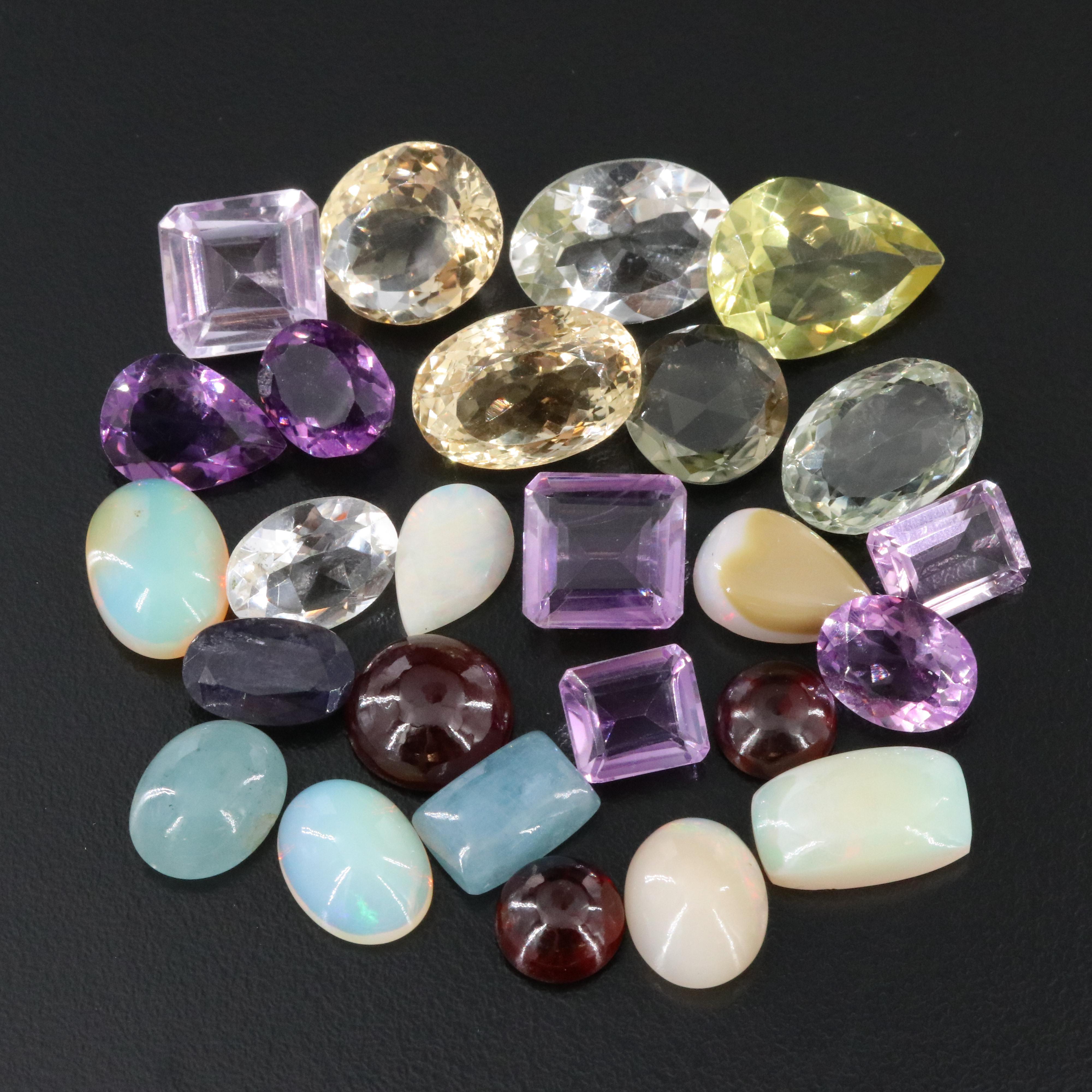 Loose 173.73 CTW Gemstone Lot Including Opal, Amethyst and Garnet